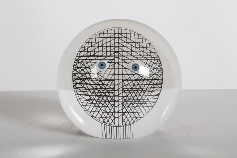 Mid-Century Modern c. 1970's Merle Edelman half round Op Art face lucite sculpture with 3D eyes over a black geometric grid. Similar style as Abraham Palatnik. In fine condition, no issues noted.