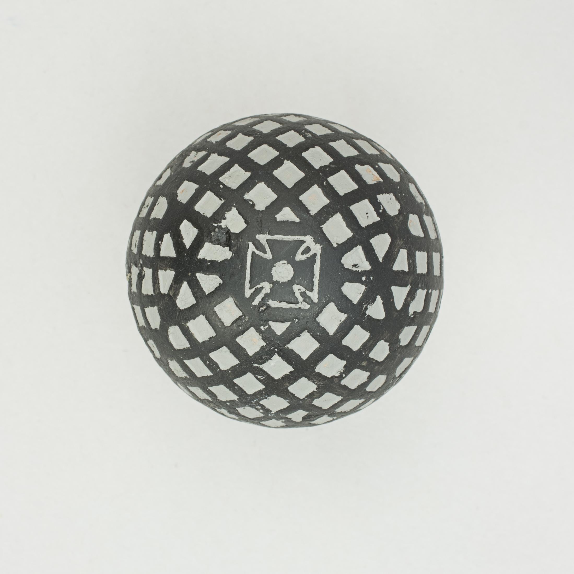 English Vintage Mesh Pattern Golf Ball, Rubber Core Maltese Cross, circa 1920