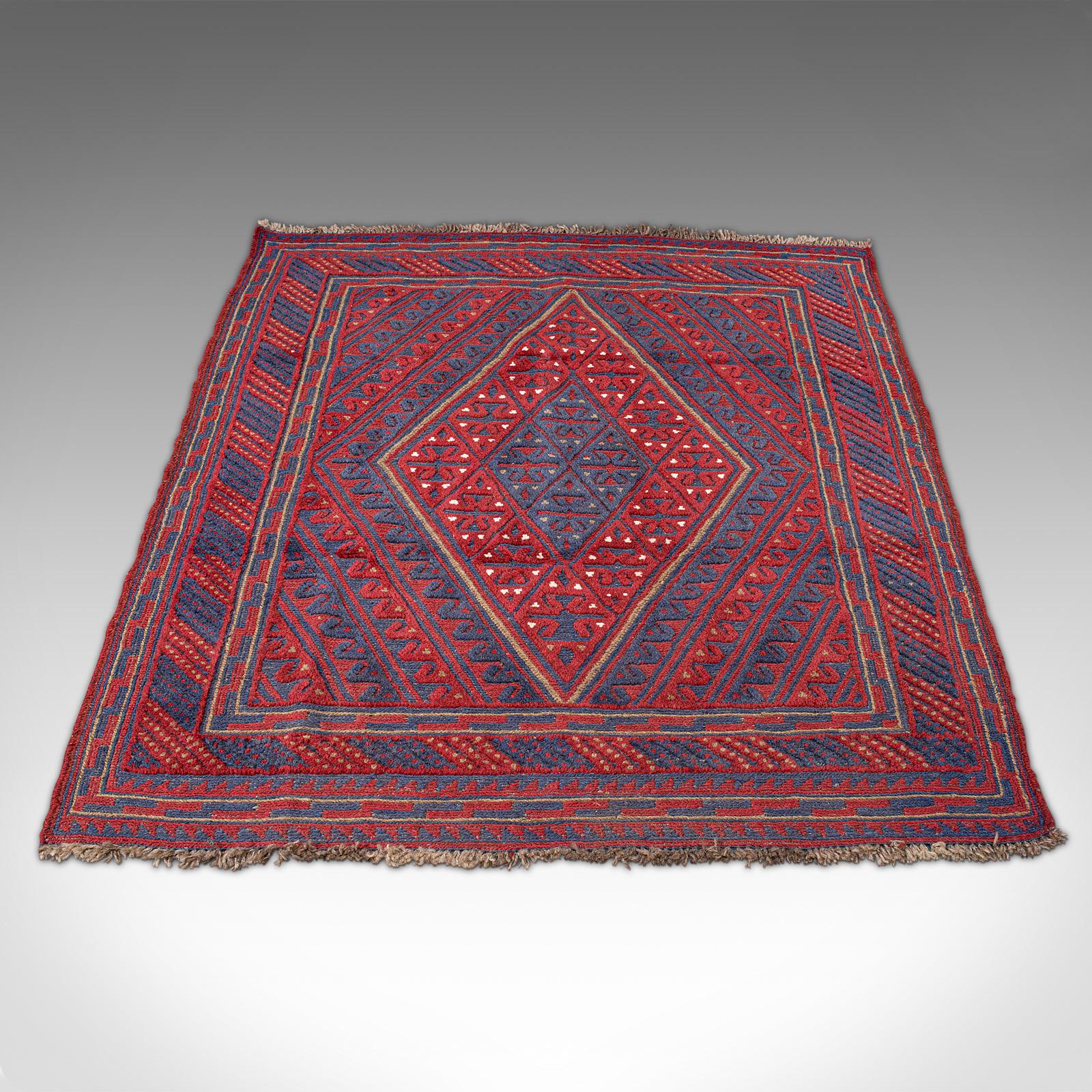 This is a vintage Meshwani Gazek rug. A Caucasian, woven hall or living room carpet, dating to the late 20th century.

Of useful Zaranim size at 108.5cm x 121cm - ideal for a doorway or lounge
Artisan hand-crafted using traditional skills with