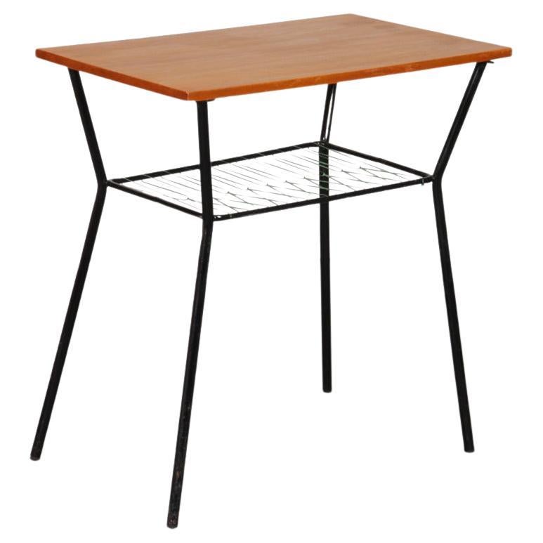 Vintage metal and wood table from the 1960s