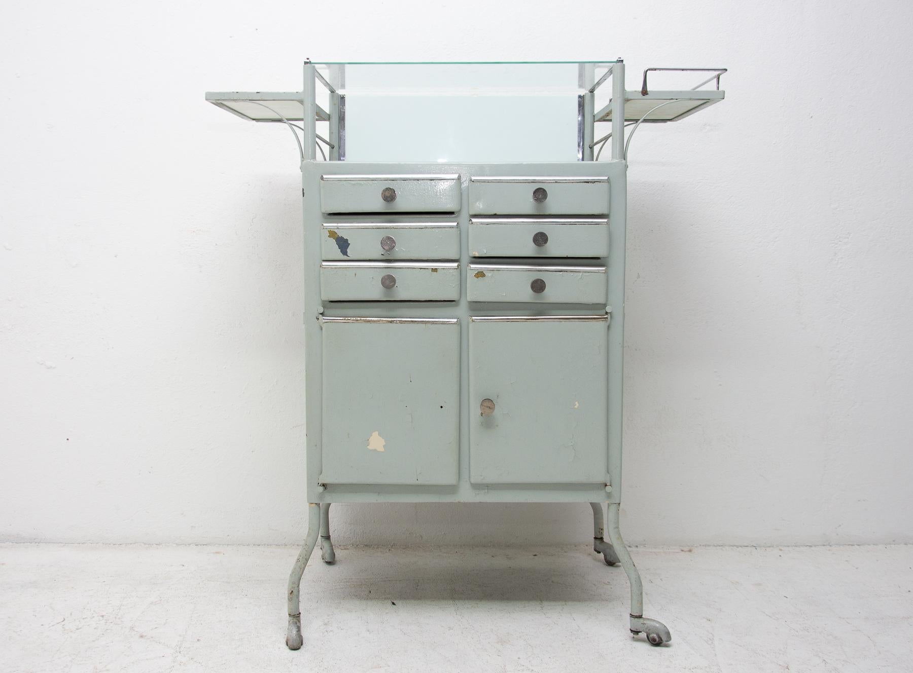 antique metal apothecary cabinet