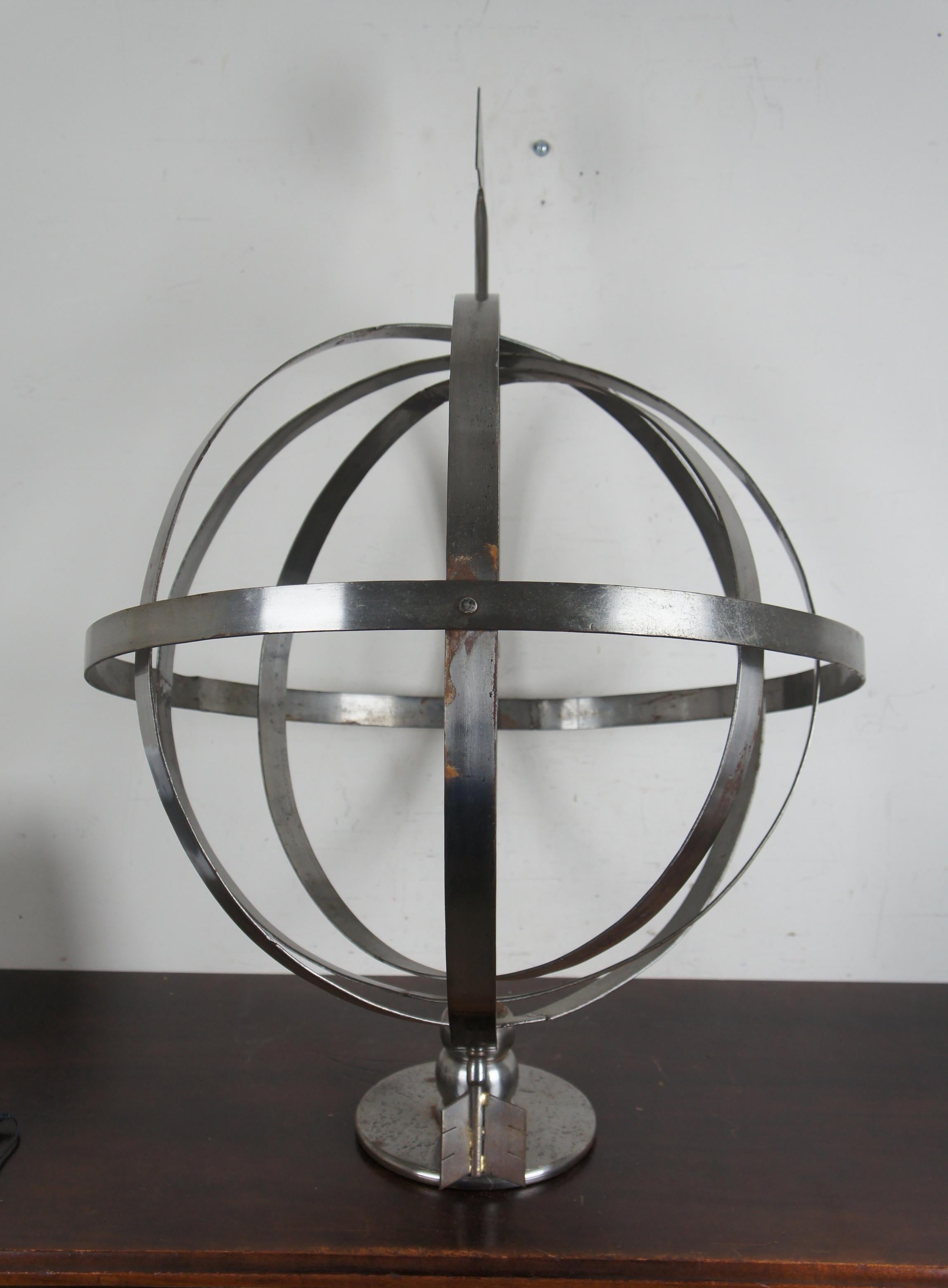 metal globe sculpture