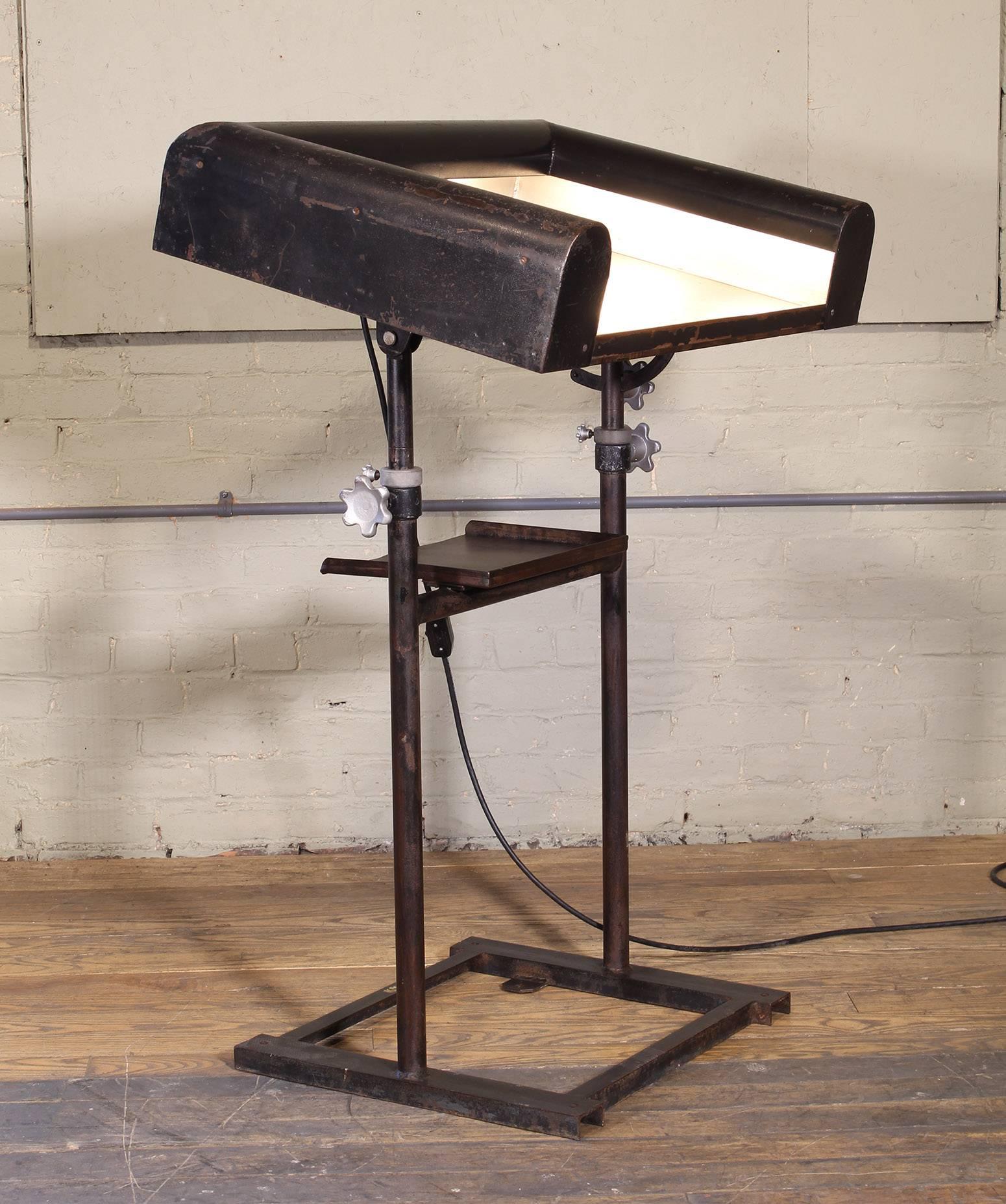 Vintage art deco modern style metal lighted lectern, podium, pedestal stand. Fixed height. Inline switch for lights. Overall dimensions measure 31 1/2