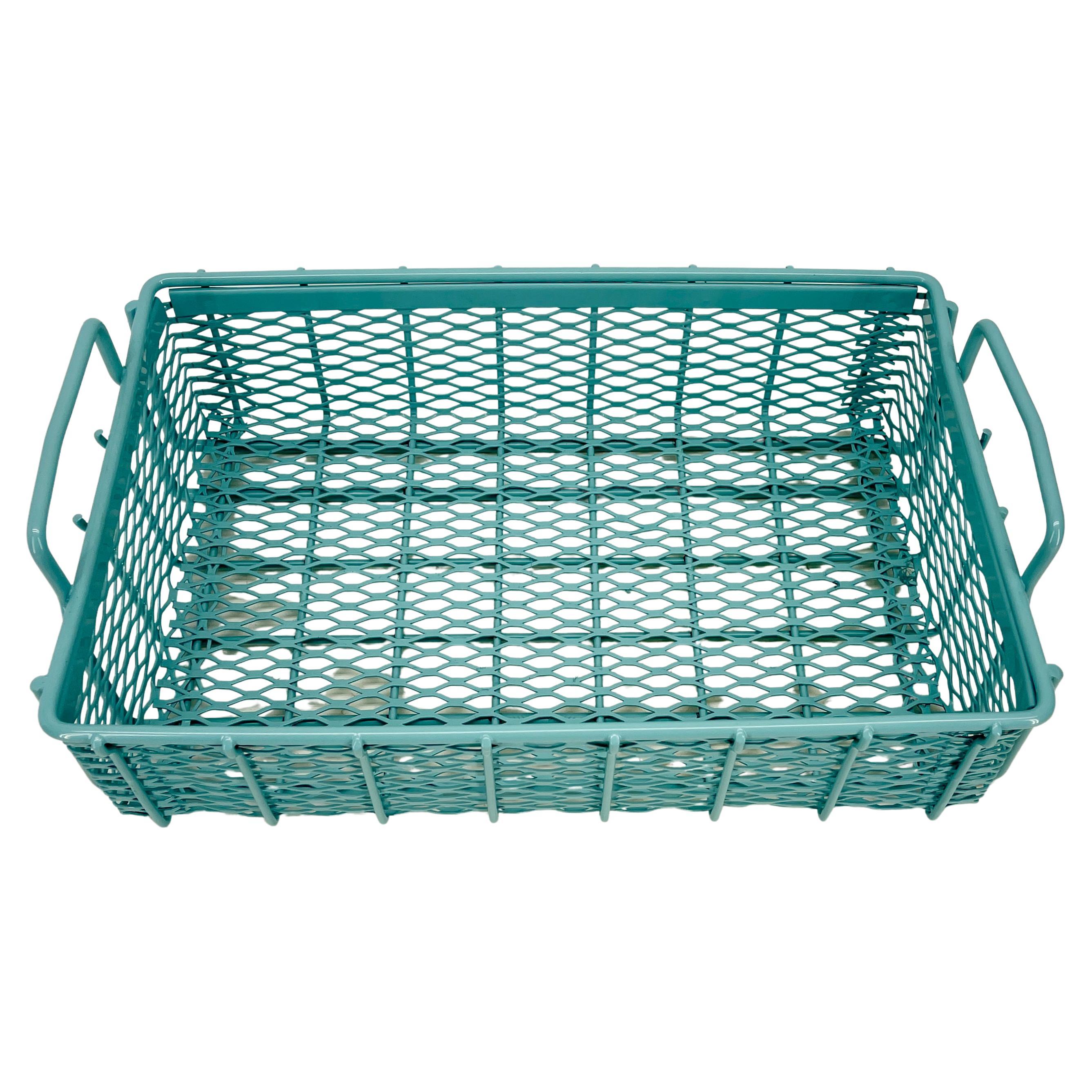Industrial era metal stackable bins or baskets with handles. Freshly powder coated in vintage mellow turquoise. The bins have endless uses; in an office, mud room, hallway, or office. The beautiful, functional and hand-crafted bins are sturdy and