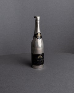 Ouvre-bouteille vintage en métal avec design en forme de bouteille de champagne, France, années 1910