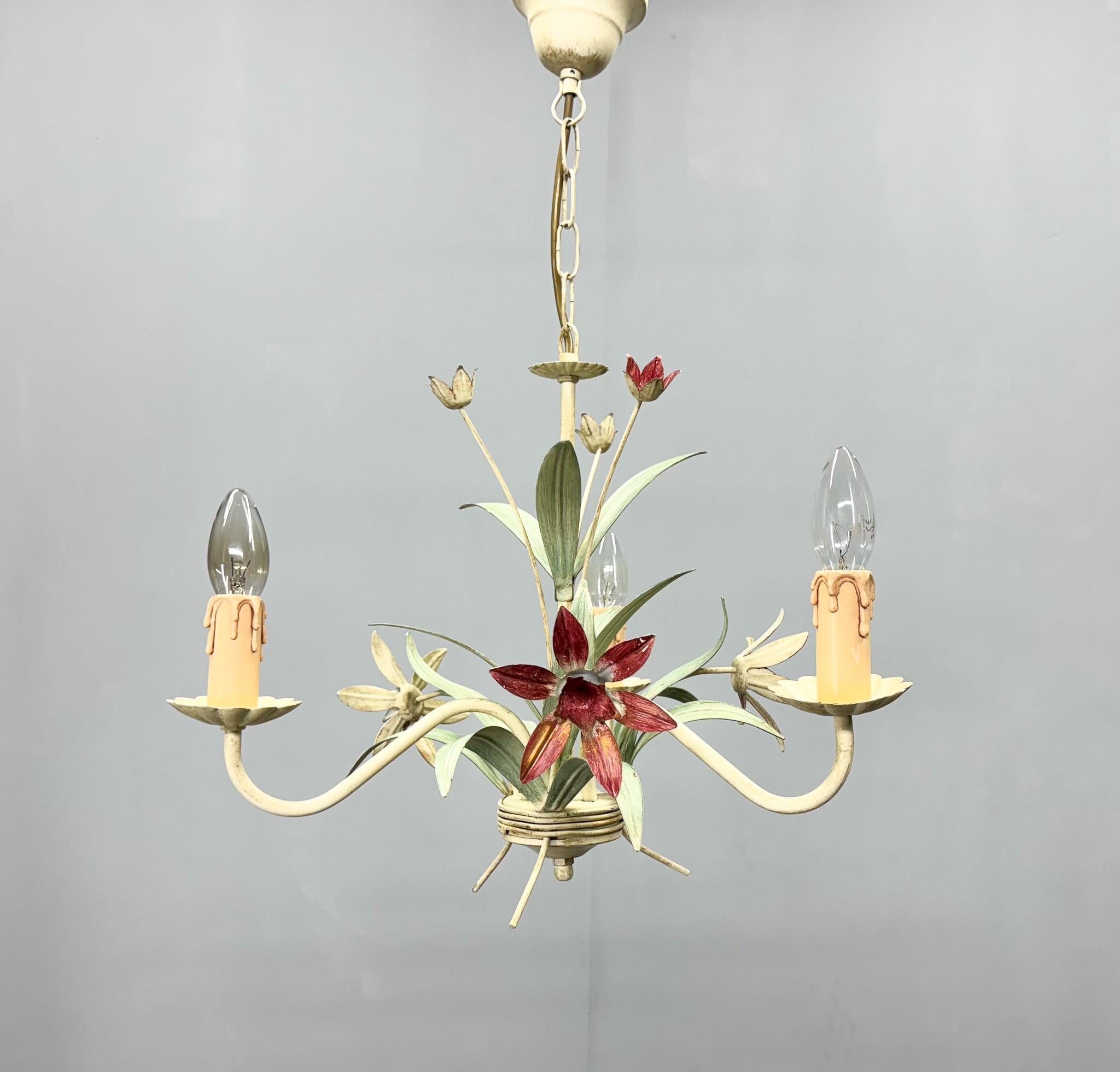Mid-century floral chandelier made of metal. 
Produced in France in the 1970's.
US wiring compatible.
Bulbs: 3x E14