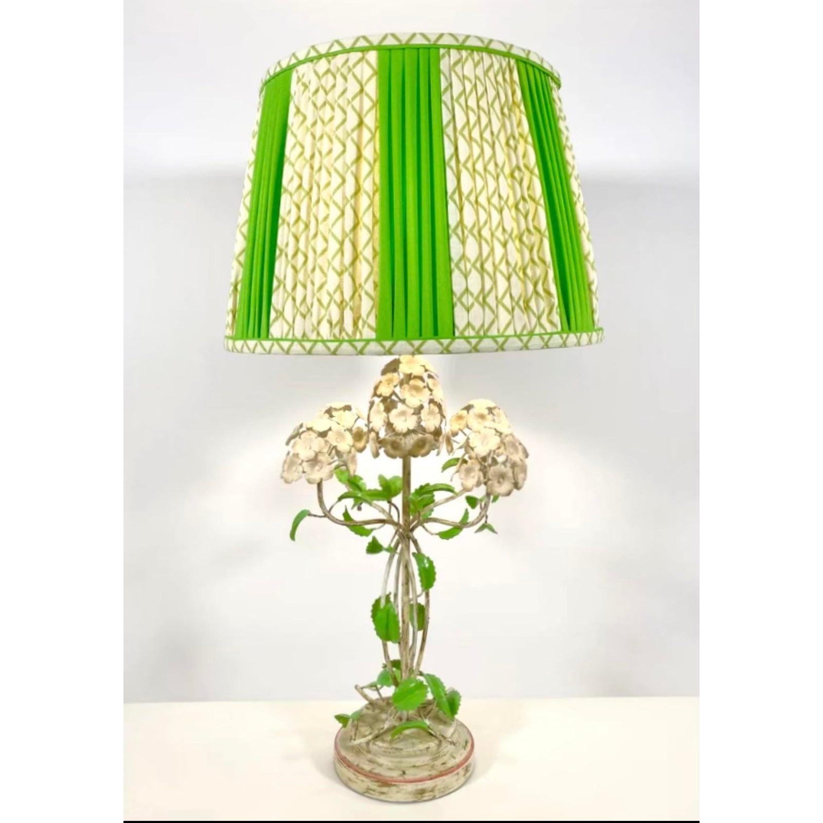 A stunning vintage green and cream colored metal floral lamp. It is a super chic and useful addition to your home. Acquired at a Palm Beach estate.