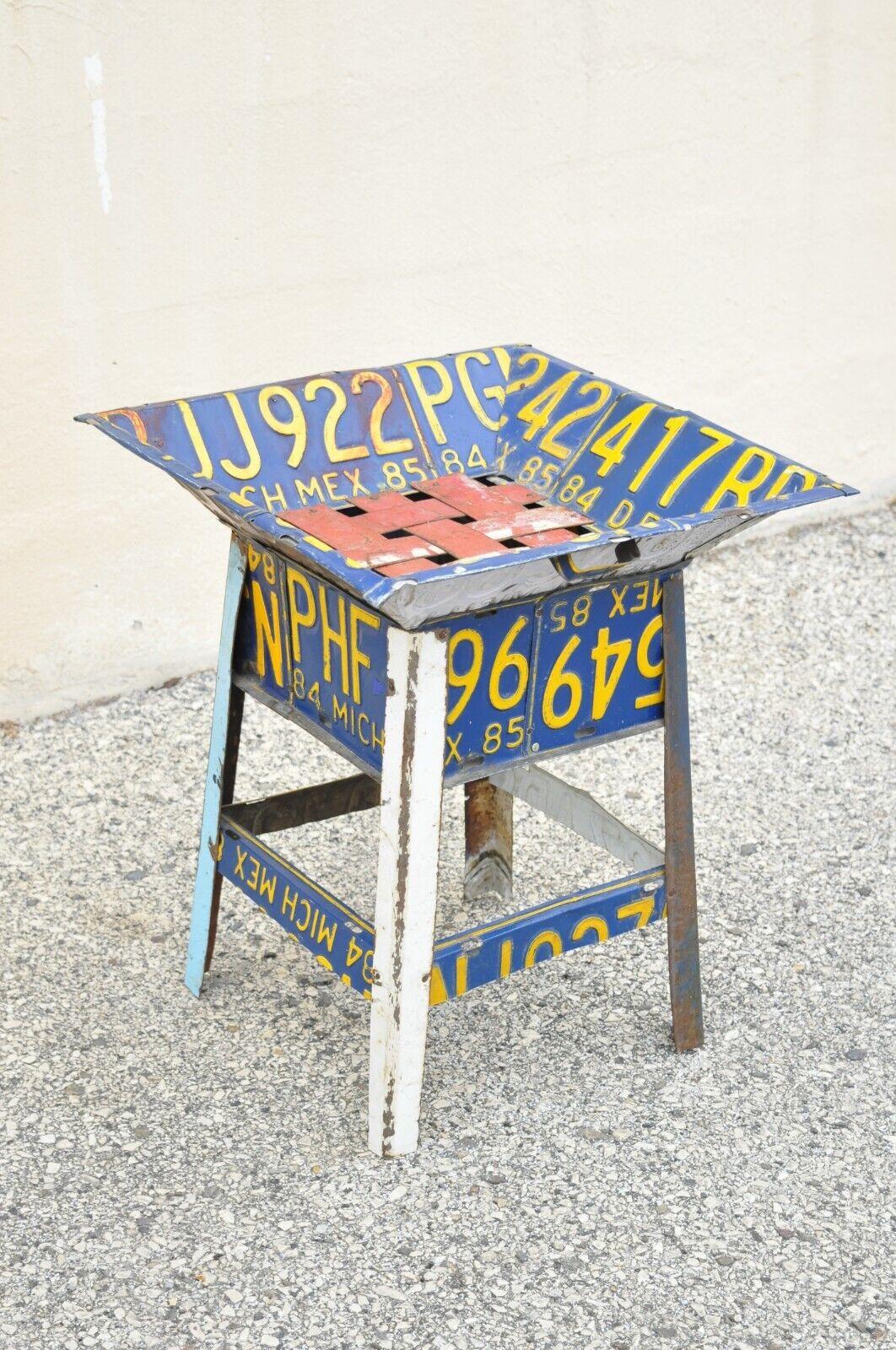 Vintage metal license plate accent side end table of reclaimed Mexican car plates. Circa mid to late 20th century. Measurements: 20
