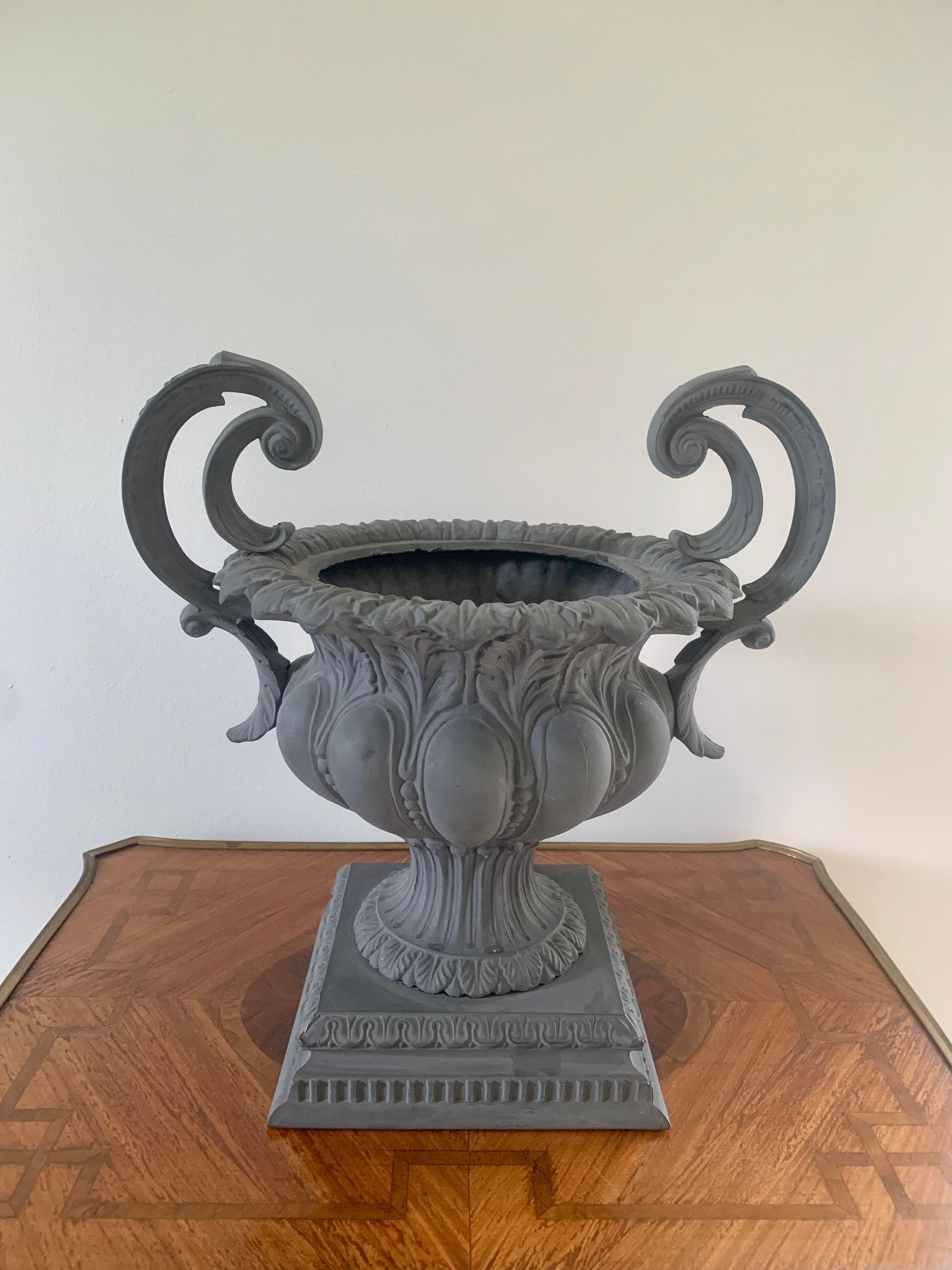 A lovely vintage cast zinc Neoclassical style urn planter

Measures: 14