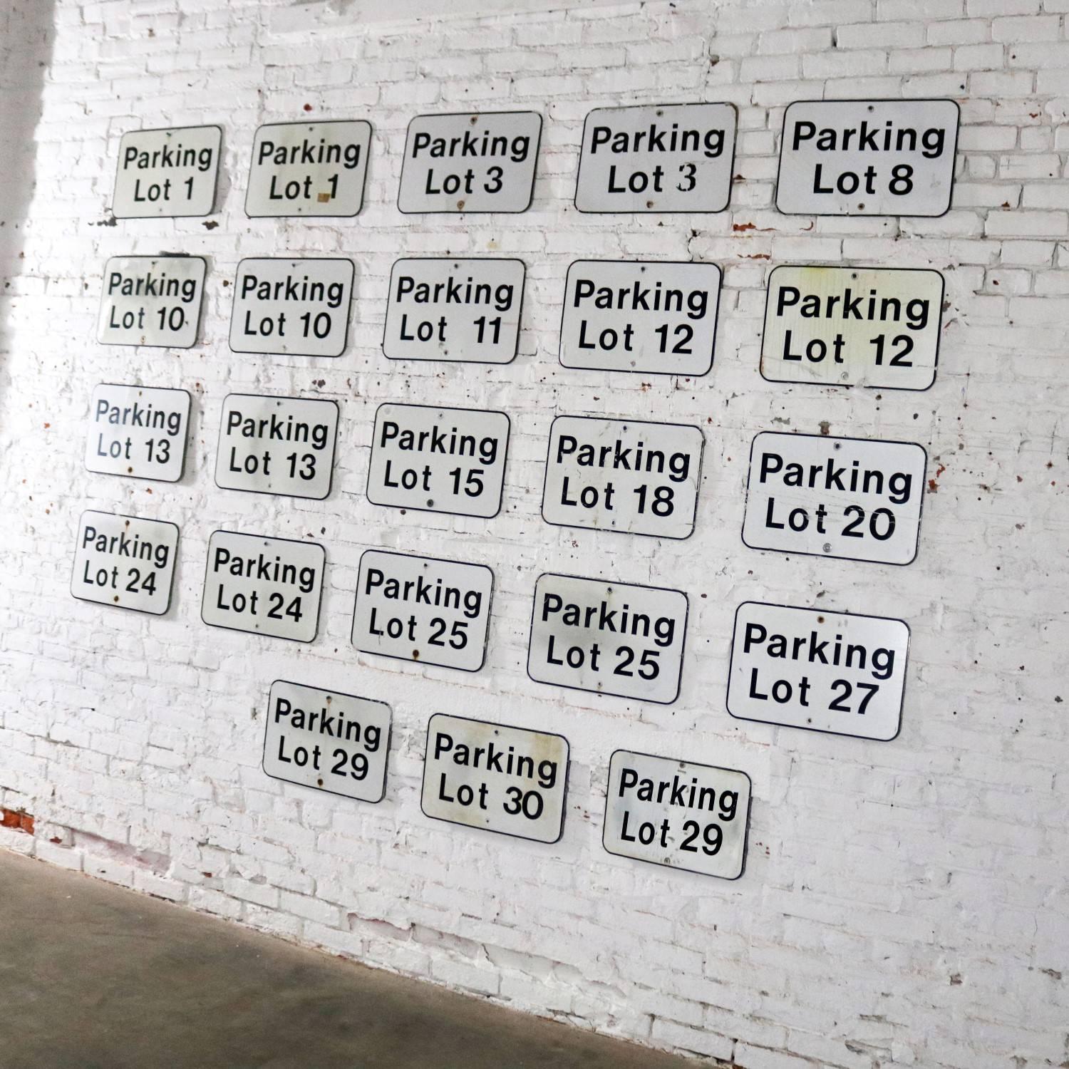 We are offering here 23 vintage metal parking lot number signs. They are in differing degrees of condition and patina but all wonderful. We have priced them per sign but will sell all 23 for $1900.00 or will give group pricing if desired, circa 20th