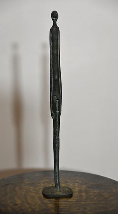 Scultura vintage in metallo alla maniera di Giacometti