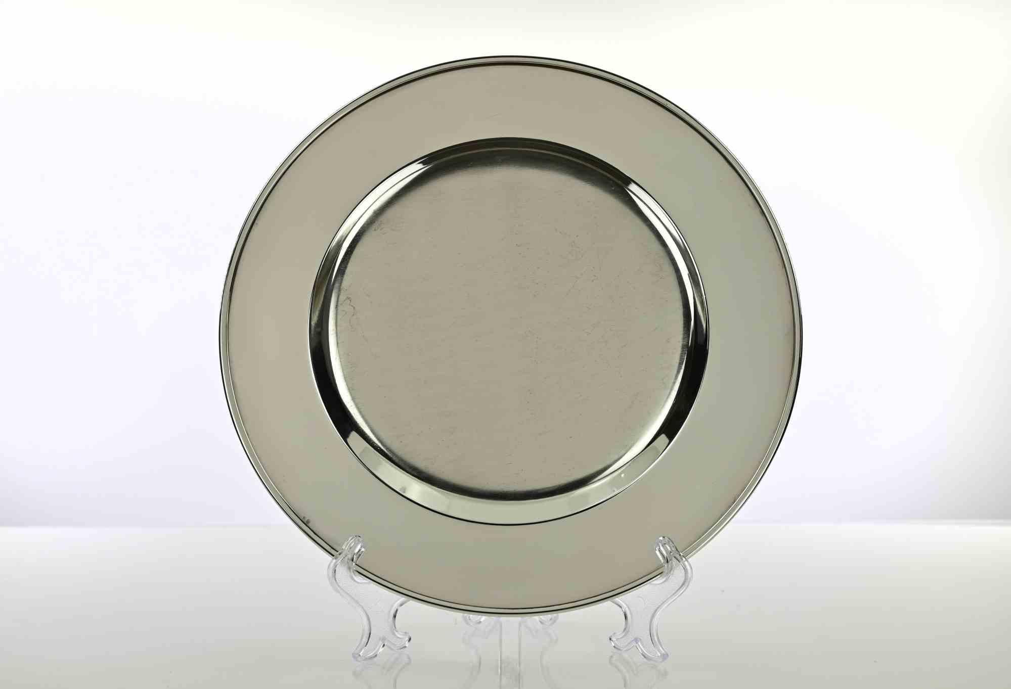 Assiette de service vintage en métal argenté réalisée en Italie dans les années 1970.

Excellent état.