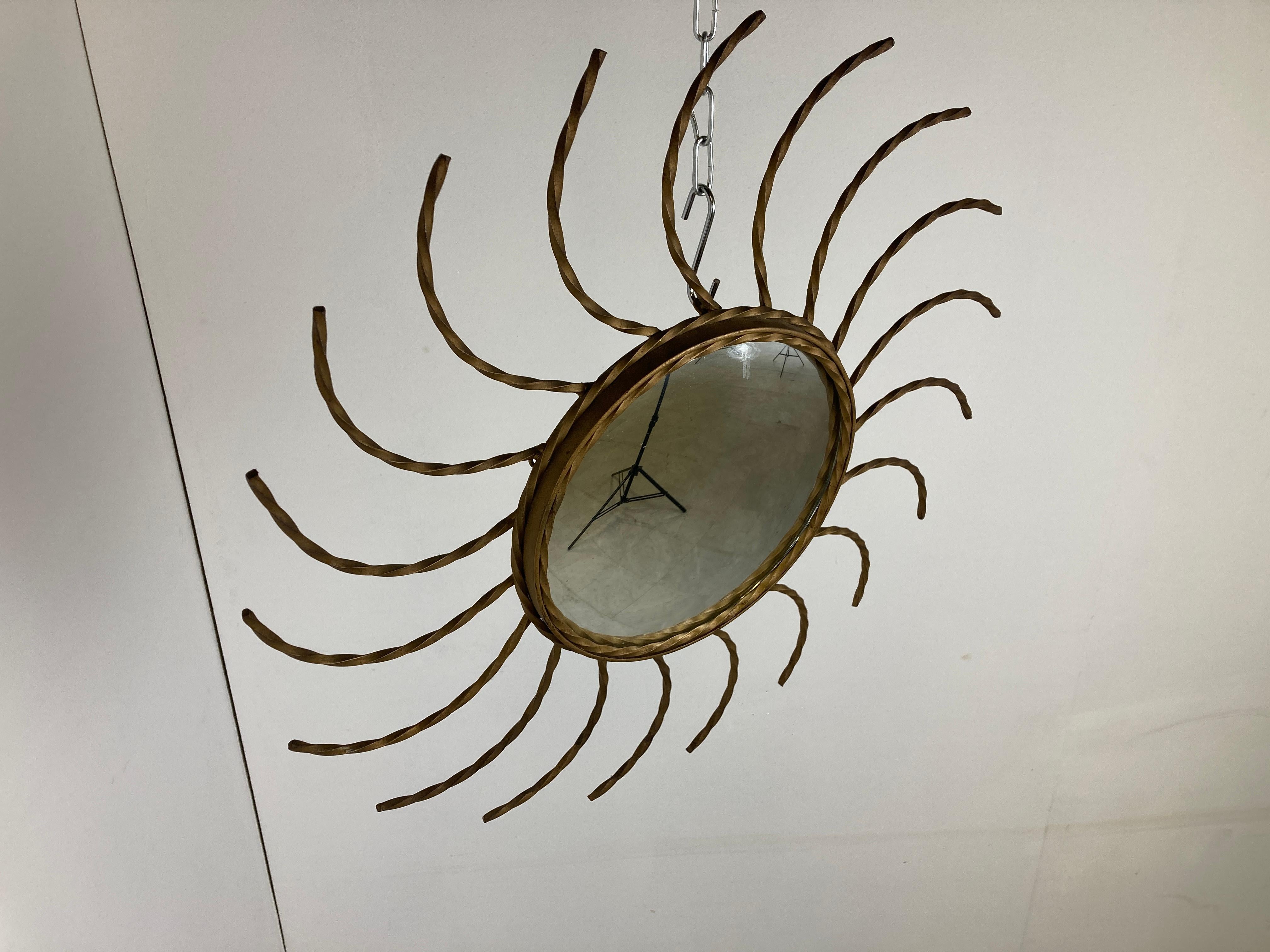Vintage metal sunburst mirror 1970s In Good Condition For Sale In HEVERLEE, BE