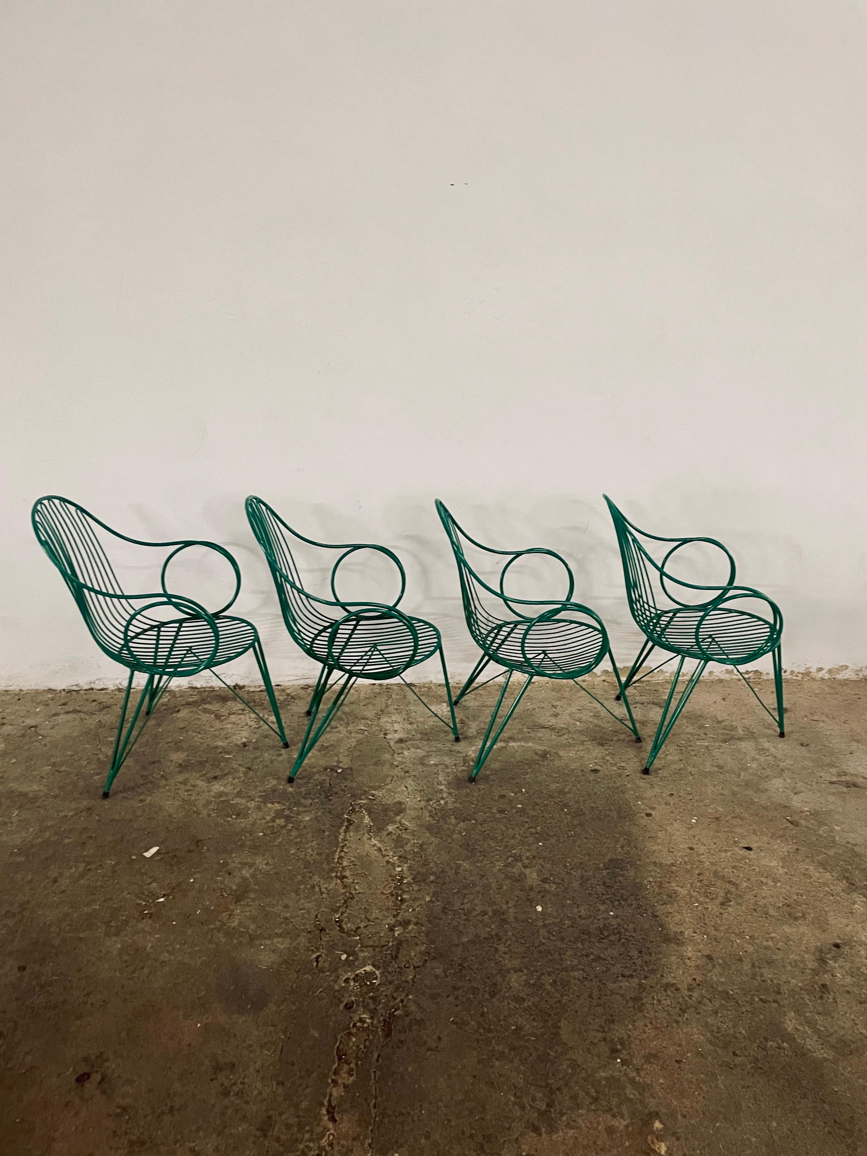 Set of 4 Rare French Vintage metal garden three-legged chairs or dining chairs, original color, great patina, 
These chairs remain fully functional, they show signs of age through scuffs, dings, faded finishes, some surface defects, and visible