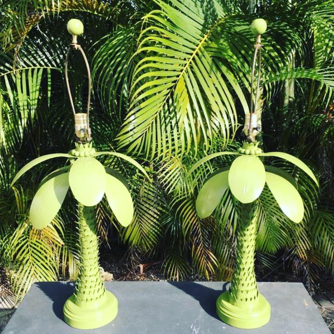 Lovely pair of vintage metal tole palm tree leaf table lamps includes matching finial. These lamps will be rewired prior to shipping including all new hardware, sockets, and harp. Finish is as found but in excellent condition. These can be