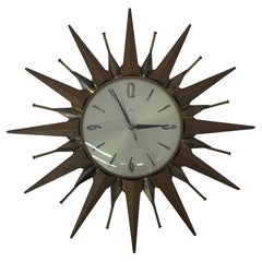 Vintage Metamec sunburst clock teak and brass , 1960’s