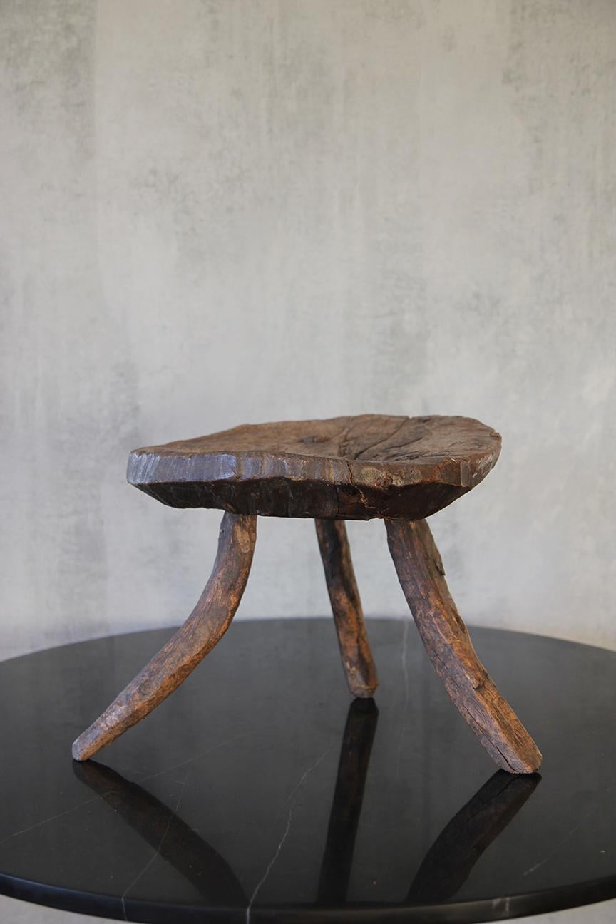 19th century mesquite hardwood stool from Mexico. All original legs.
Completely primitive in style. 