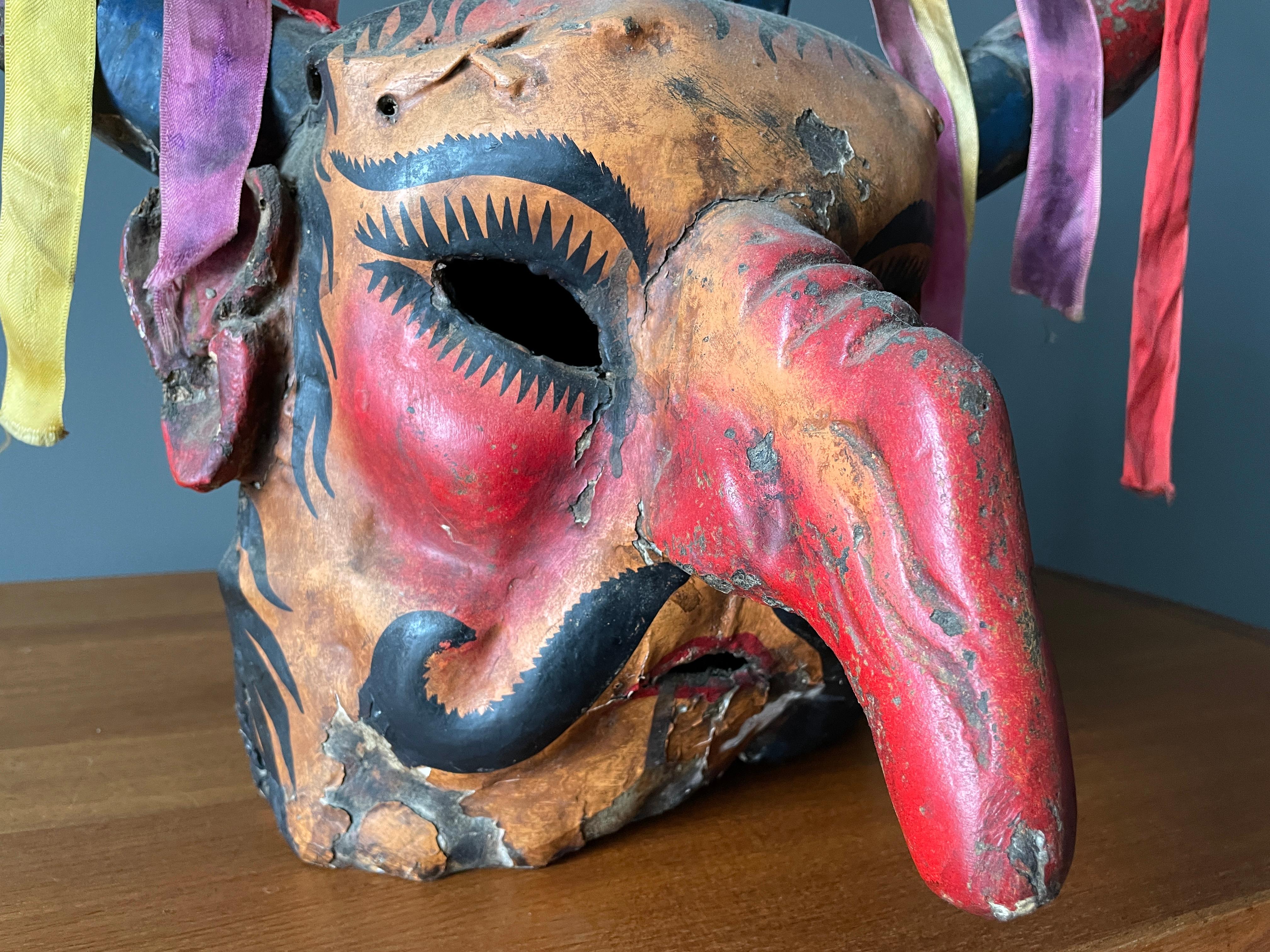 Vintage ceremonial Mexican style plaster mask. A beautiful piece of folk art. Would look great in any room.