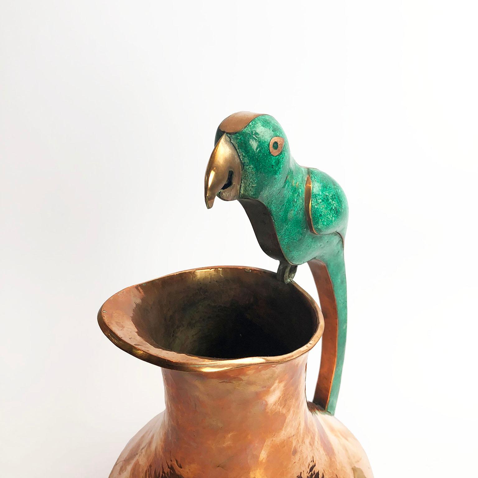 Copper and Azurite Pitcher by Villasana of Taxco, Mexico sporting an amazing handle in a parrot motif. Alfredo Villasana worked for both William Spratling and Hector Aguilar before opening his own workshop. The pitcher Marked VILLASANA. In excellent