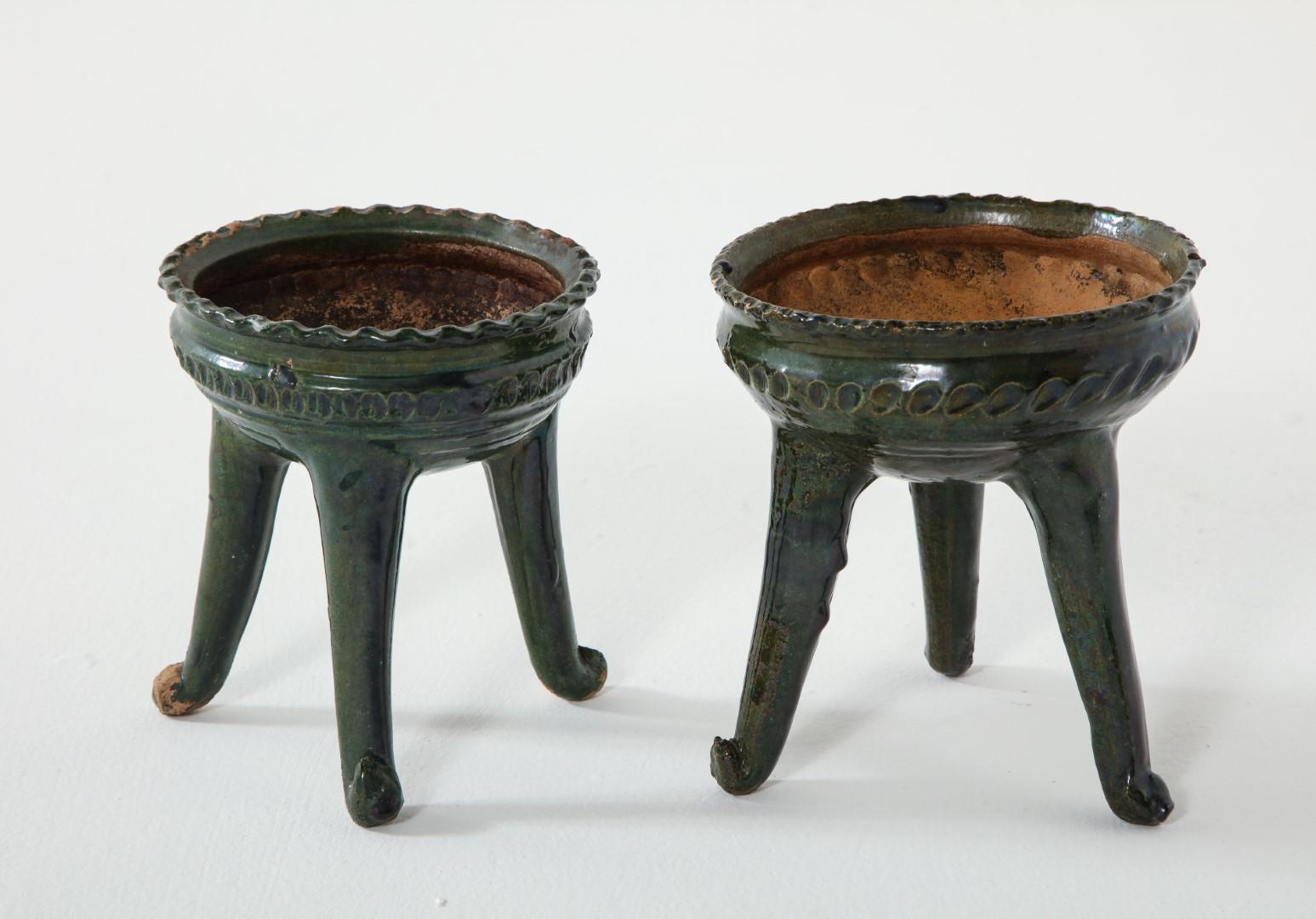 A pair of vintage green-glazed pottery footed bowls, from Morelia, Mexico. 1960s. Sweet as small planters. 

Slight size variations: 
Smaller 6.25