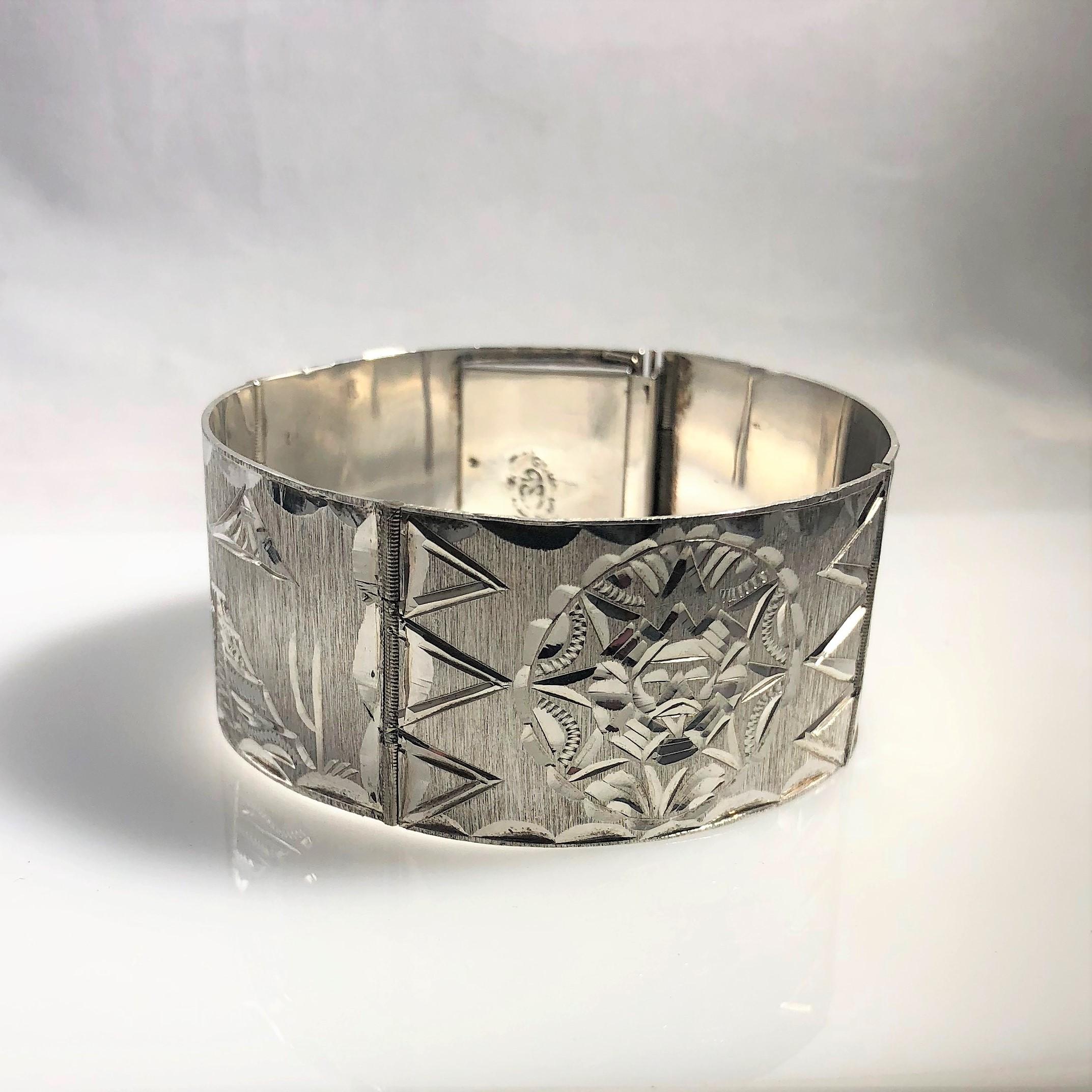 Vintage Mexican Mayan Sterling Silver Hand Engraved Cuff Bracelet. This is a very interesting and well made piece. This piece is estimated to be vintage,possibly Aztec and is made of sterling silver, 925, it weighs 34.2 grams. We believe that the
