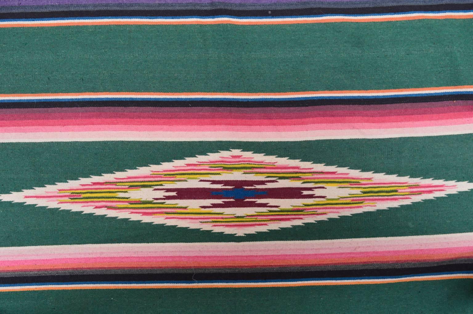 Light weight and very soft wool serape blanket from Saltillo, Mexico, circa 1930.
Handwoven in soft wool on very fine cotton warp threads ended with hand knotted fringe. In excellent condition.
     