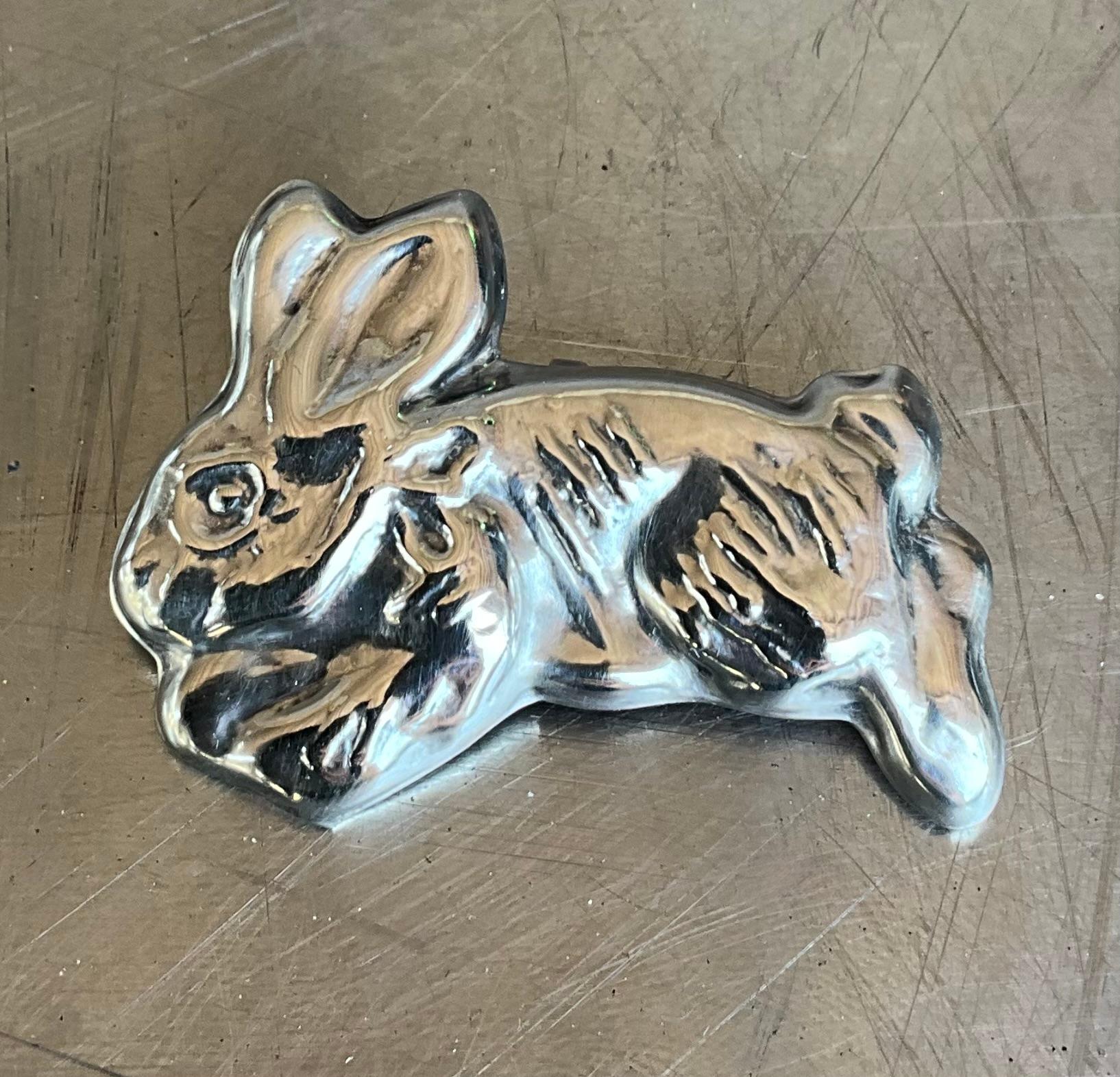 A Vintage Mexican Sterling Silver Hopping Bunny Rabbit is a charming and whimsical piece of jewelry that showcases the skilled craftsmanship of Mexican silversmiths. This piece features a hopping bunny rabbit in mid-motion, capturing the playful and