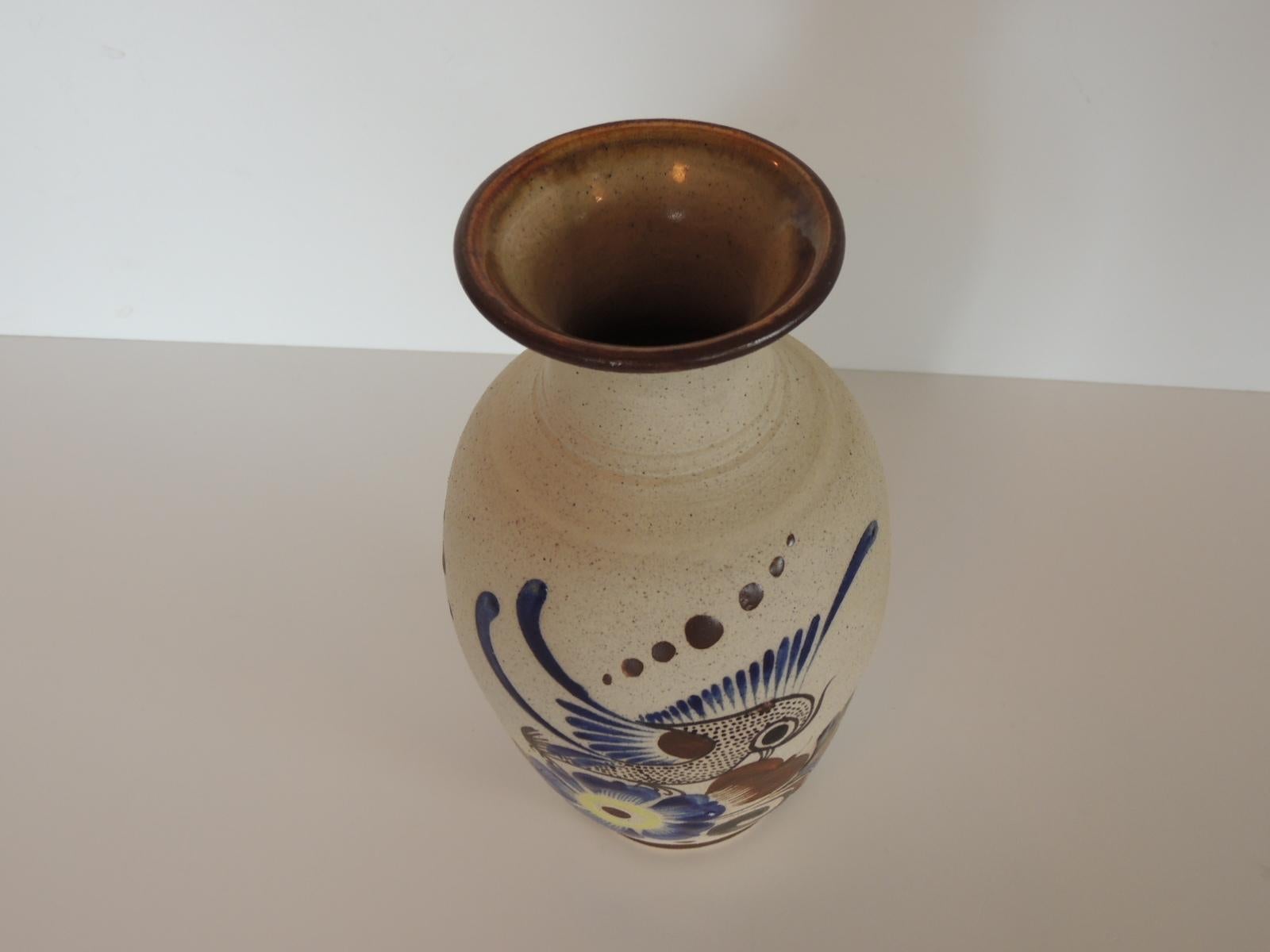 Vintage Mexican Talavera hand painted ceramic vase.
Round vase depicting bird and flowers. Signed Puerto Vallarta 1990
Size: 5