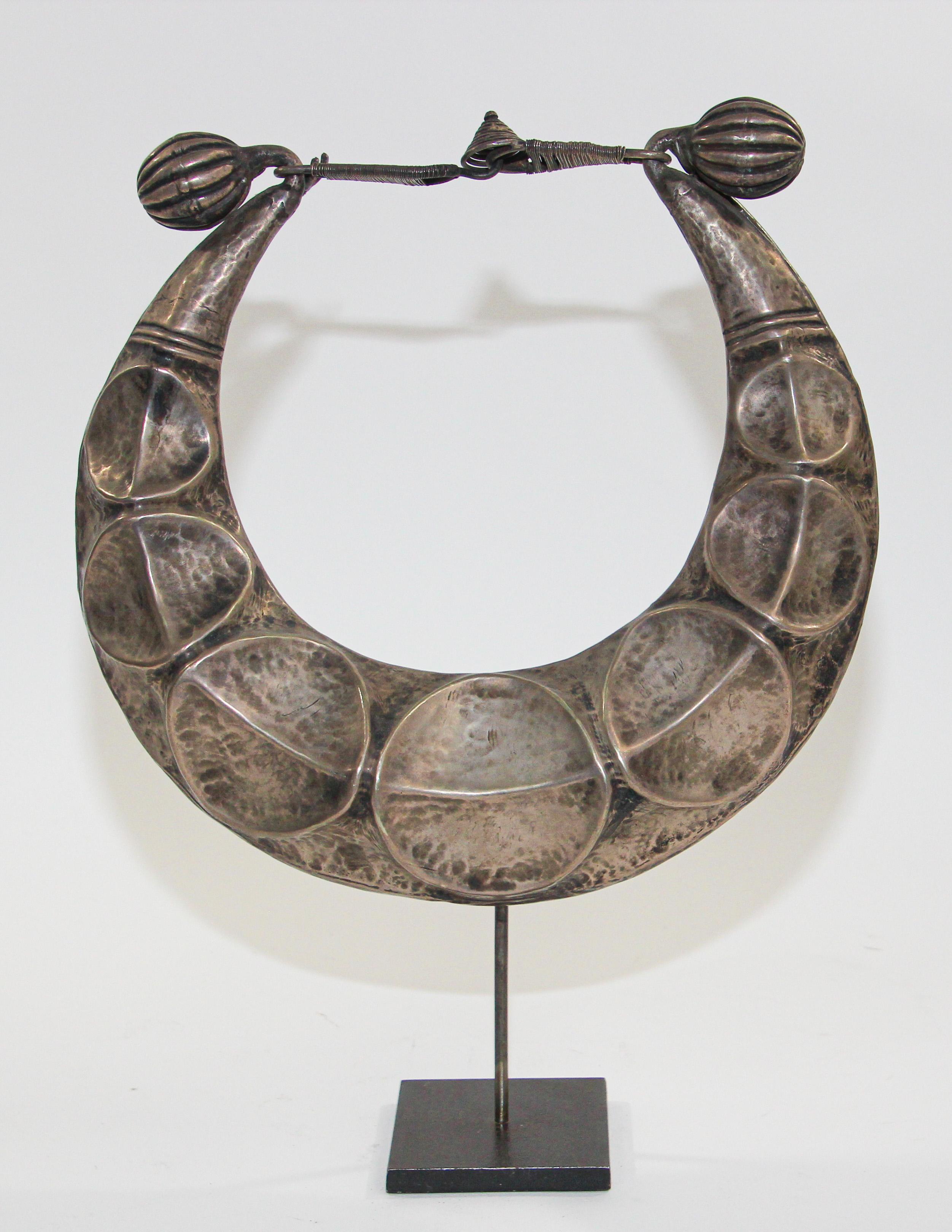 Vintage Miao Hmong ceremonial mix silver collar necklace on custom stand, Laos.
This beautiful Miao Hmong ceremonial mix silver Necklace would be a wonderful addition to your collection, home or to simply treasure for yourself.
Comes with a stand.