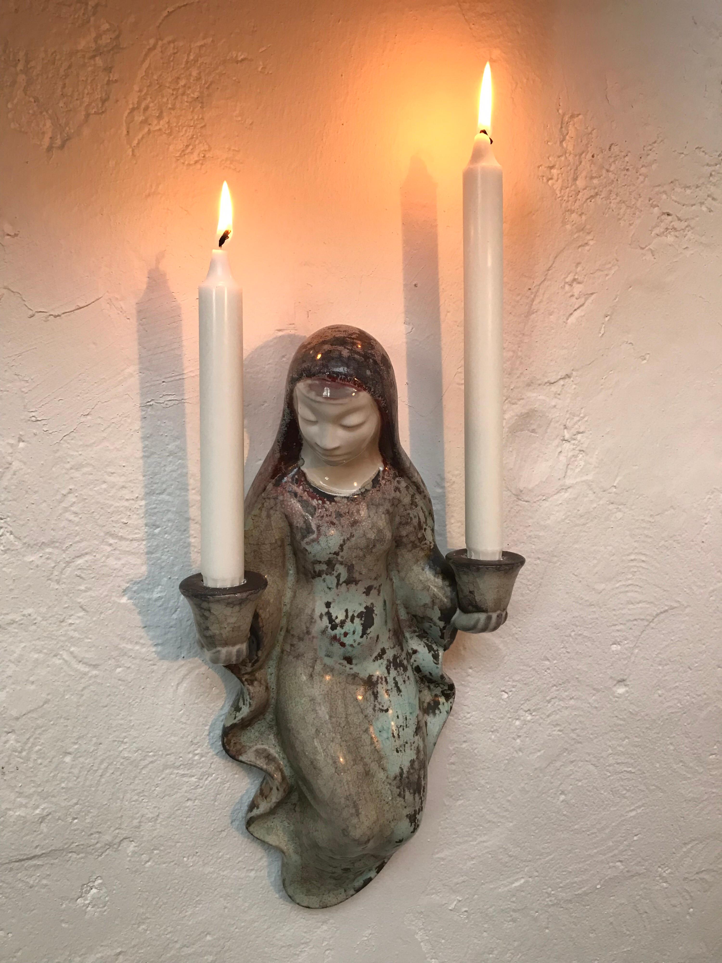 Vintage Michael Andersen ceramic candleholder possibly in the form of a Madonna 
Achingly beautiful and such a wonderful piece of faience 
Michael Andersen started producing ceramics in 1771 in Rønne on the island of Bornholm Denmark and today has
