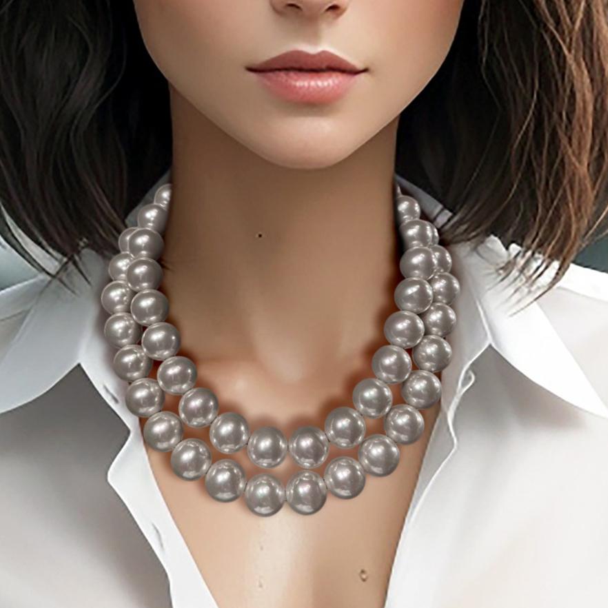 A Vintage Costume Jewelry Michael Kors Bergdorf Goodman Runway Show Two Strand Big Pearls Necklace

Stunning, real-looking, lustrous  Faux Pearls, 18mm in size, made for a Michael Kors runway show at Bergdorf Goodman in 2000. They were never worn.