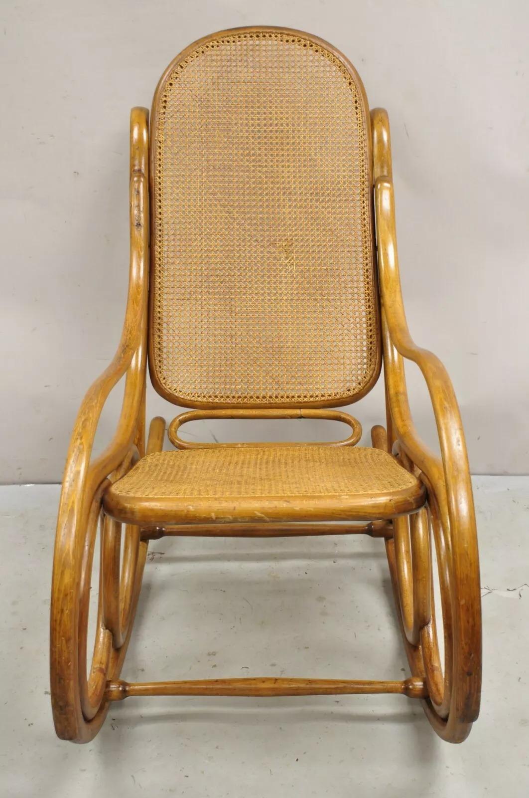 Vintage Michael Thonet Style Oak Cane Rattan Bentwood Rocking Chair Rocker. Circa Early 20th Century. Measurements: 40