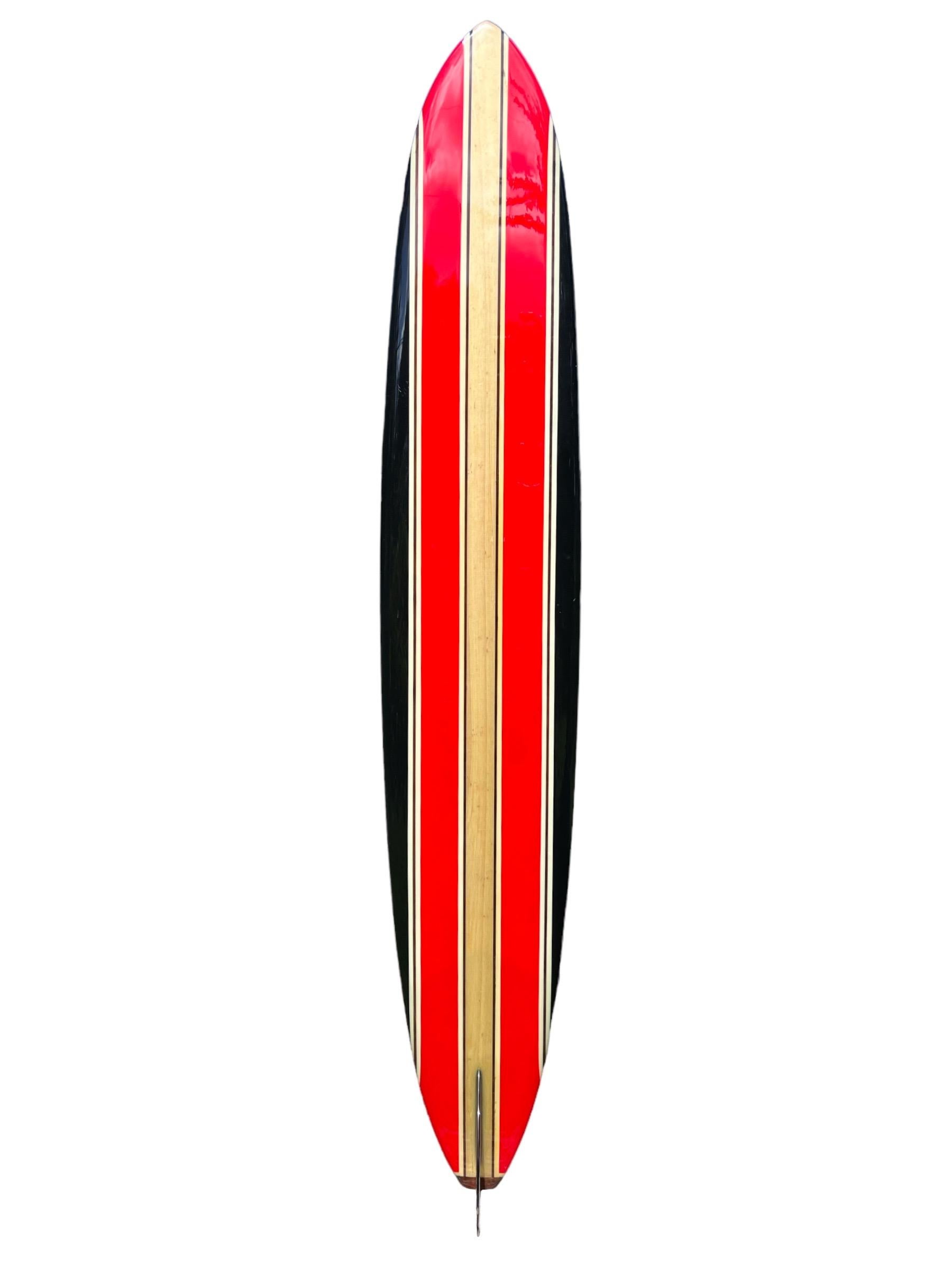 Mid-1960s Vintage Inter Island Surf Shop Big Wave Surfboard. Hand made by the late Mike Diffenderfer (1937-2002). Features a big wave Pipeliner shape design with astounding 4” thick balsa wood center string and 4 complimentary redwood stringers and