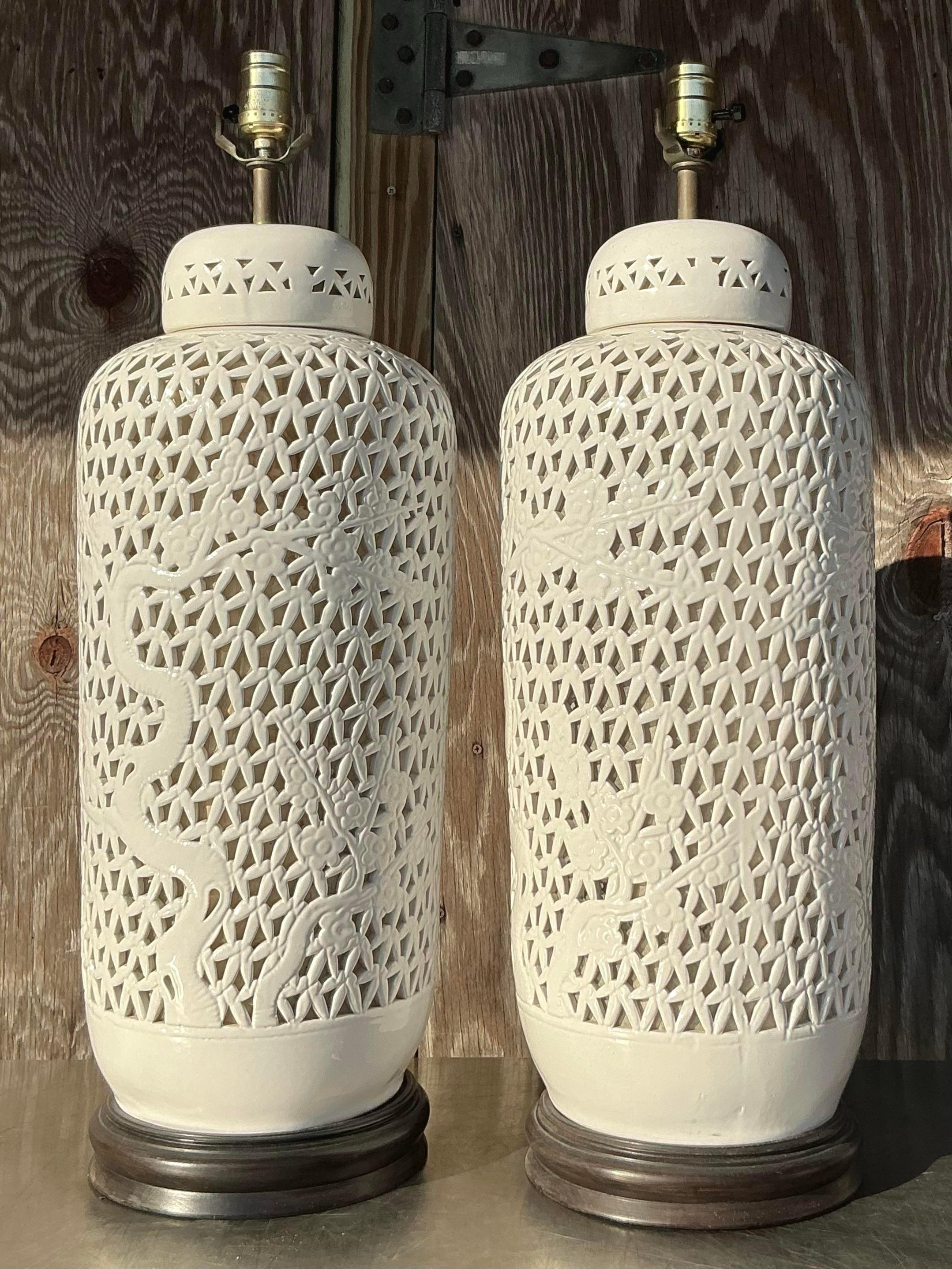 Vintage Mid 20th Century Asian Blanc De Chine Pierced Ceramic Lamps - a Pair In Good Condition For Sale In west palm beach, FL