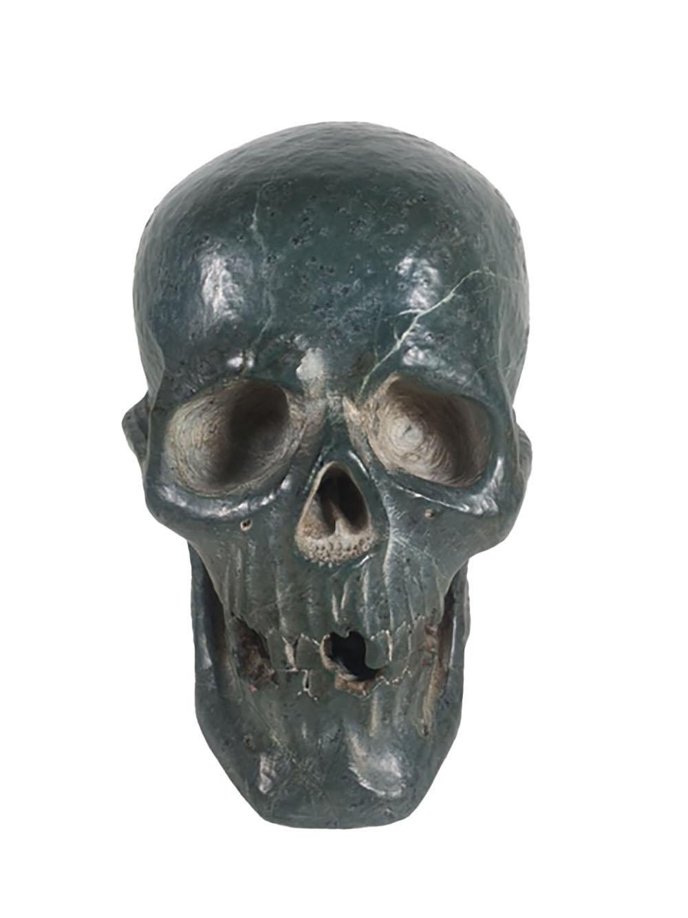 Old hand carved gothic style life size solid marble skull.
