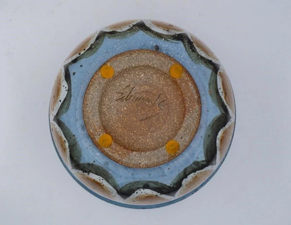 Vintage mid 20th century large lidded pottery pot by Joel Edwards (1923 - 2007) California.  Signed on bottom, blue matte glaze with ochre leaf design, speckled gray glazed interior.  Well known Californian potter he studied at the Brooklyn Museum