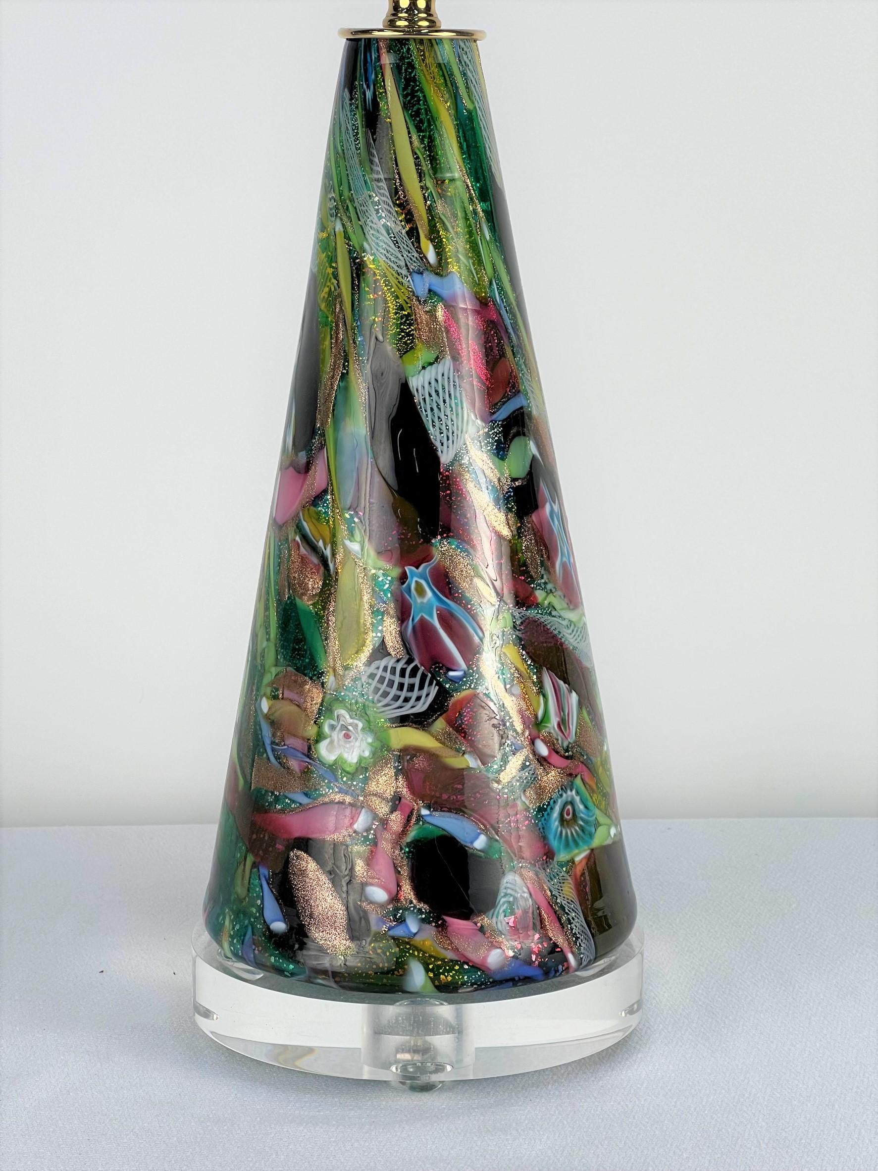 This classic vintage Millefiori conical shape table lamp base features gold flecks, aventurine ribbons, and an array of colorful art glass. The process of taking left over pieces of art glass and heat rolling them into bowls, trays, and in this case