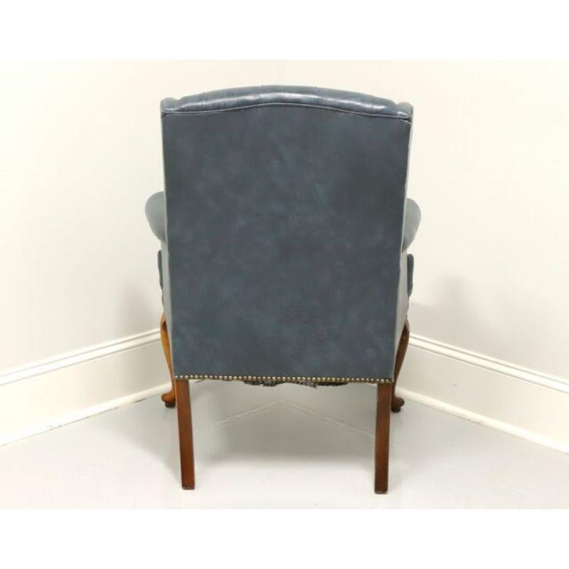 Mid 20th Century Vintage Tufted Blue Leather Queen Anne Wing Chair In Good Condition In Charlotte, NC
