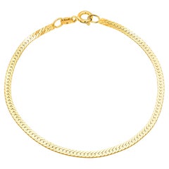 Vintage Mid Century 14 Karat Gold Designer 7 Inch Long 0.16 Inch Wide Bracelet