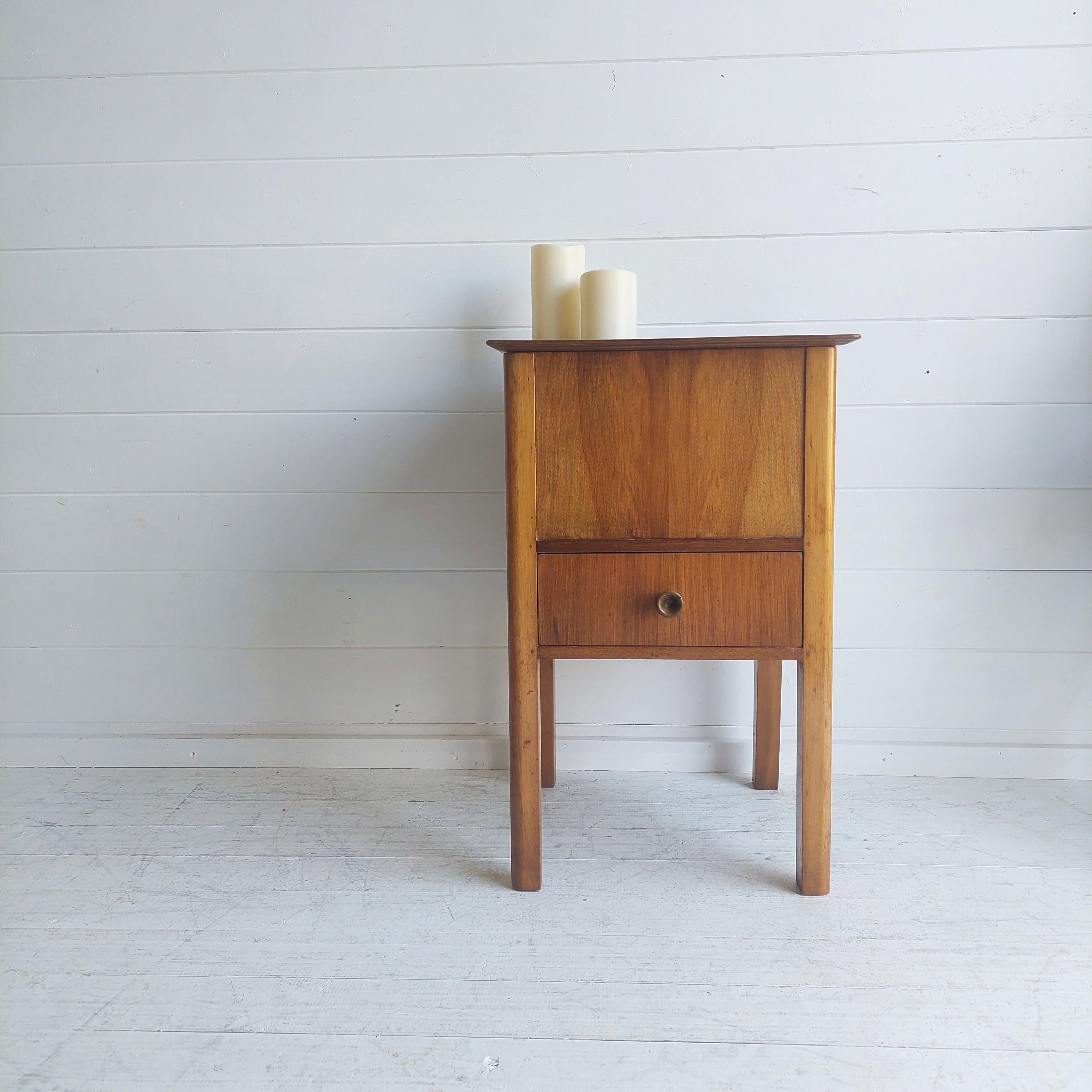 A very attractive vintage storage table, originally a sewing cabinet, made in the 1940-1950s in a typical late Art Deco/ early midcentury style
Amazing Vintage Wooden Craft / Sewing Table Side Table With Storage & Drawer. 
Absolutely beautiful