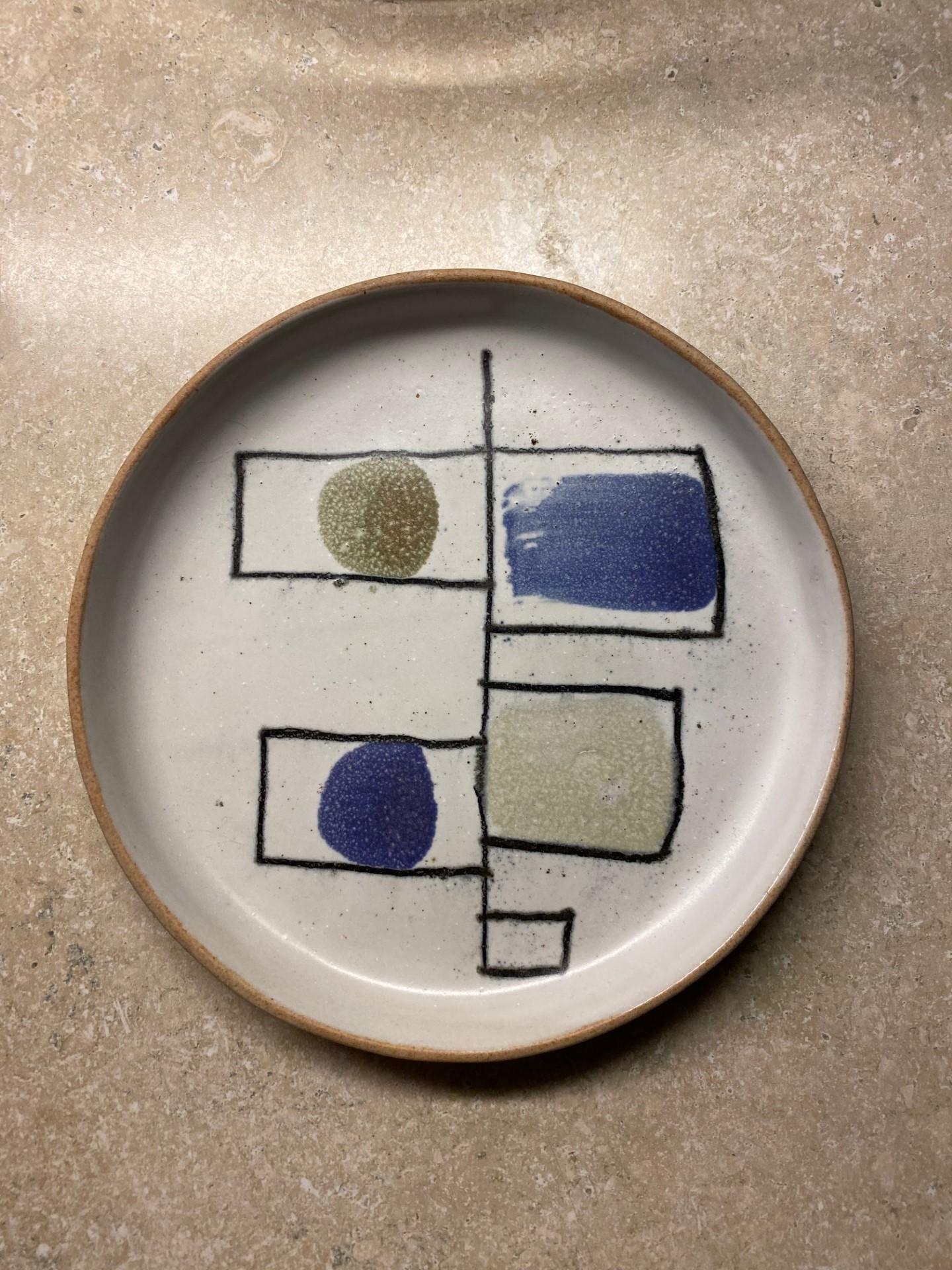 Beautiful and unique ceramic piece that is evocative of the abstract themes of the 1960s.  This rare piece by David Gil (1922-2002) is both minimalist and current.  The abstract design emerges as current and special.  This piece is in great