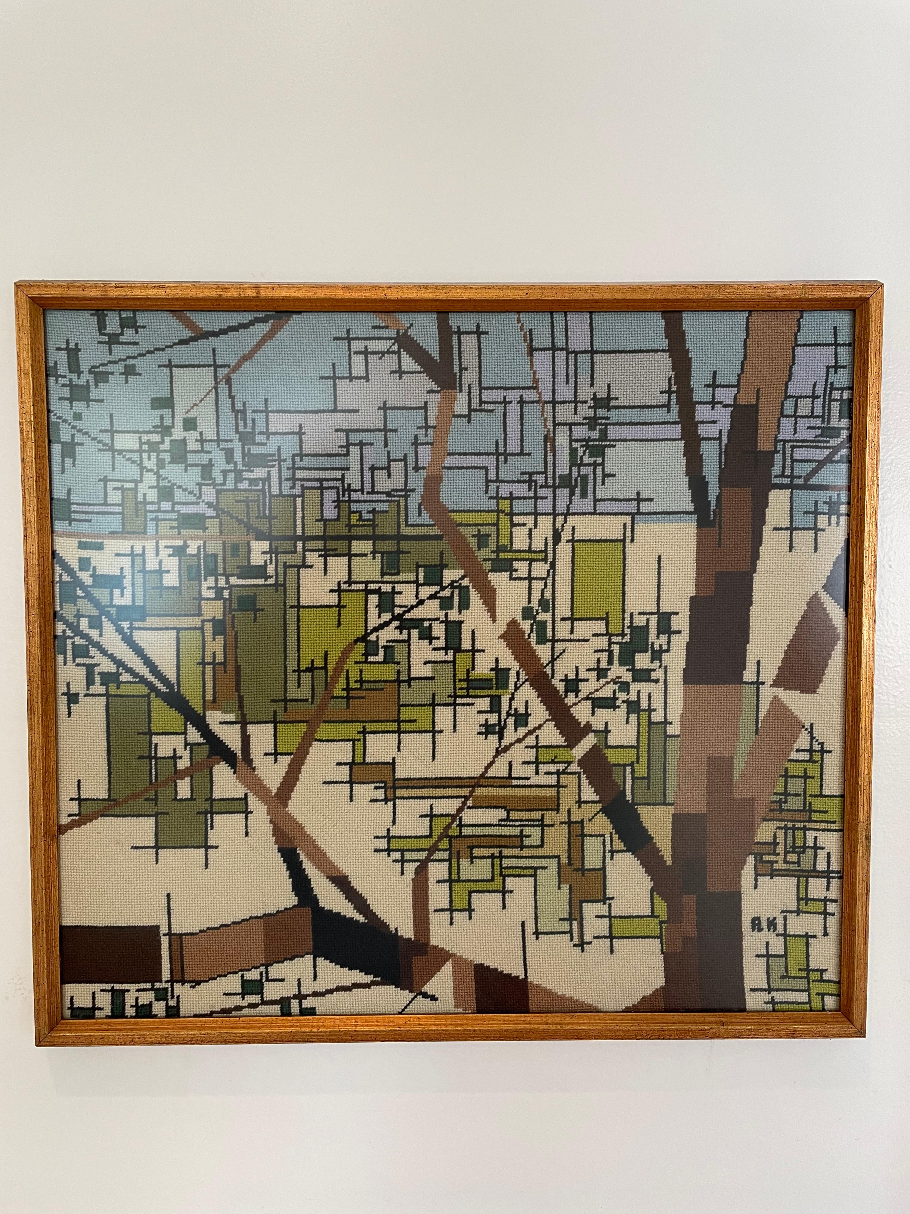 Striking Abstract Needlepoint. Great mid Century design and color. Amazing attention to detail and craftsmanship.signed AK or possibly RK. Gilt period beveled frame.