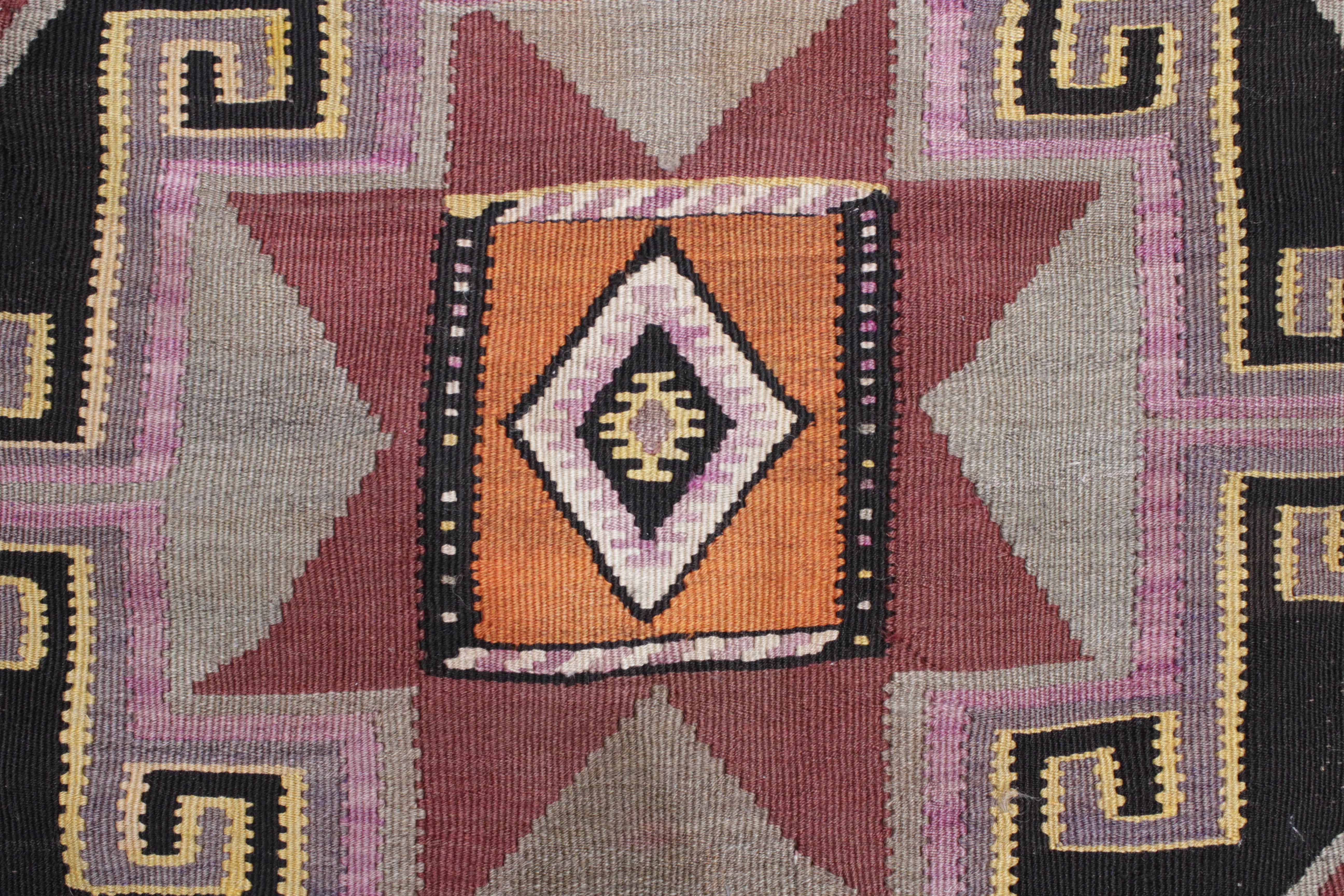 A gallery-sized example of flat-woven wool kilim originating from Kars, located in eastern Anatolia close to the border with the Caucasus. The kilims from this region are renown for their sturdiness, as well as for their bold patterns which are