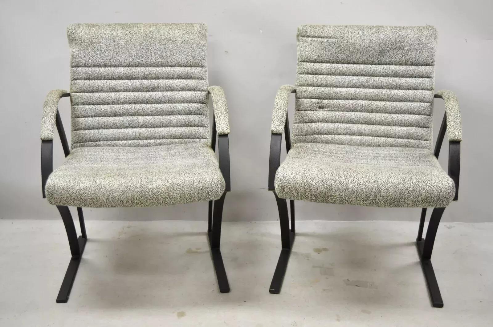 Vintage Mid Century Art Deco Metal Lounge Arm Chairs by Cal-Style (A) - a Pair. Item features a channel back and seats, upholstered armrests, original label, clean modernist lines, sleek sculptural form. Circa Late 20th Century. Measurements: 32.5