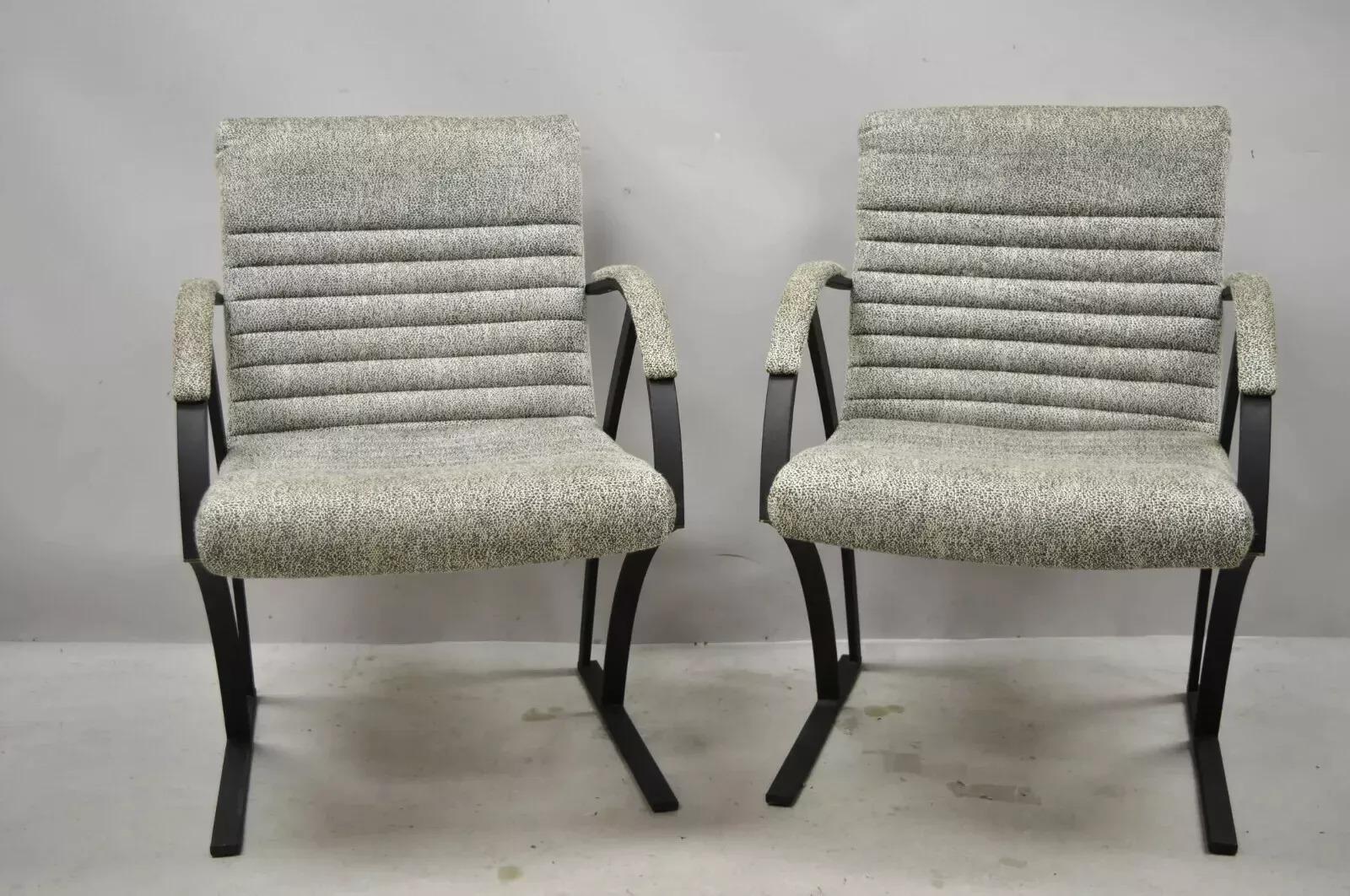 Vintage Mid Century Art Deco Metal Lounge Arm Chairs by Cal-Style (B) - a Pair. Item features channel back and seats, upholstered armrests, original label, clean modernist lines, sleek sculptural form. Circa Late 20th Century. Measurements: 32.5