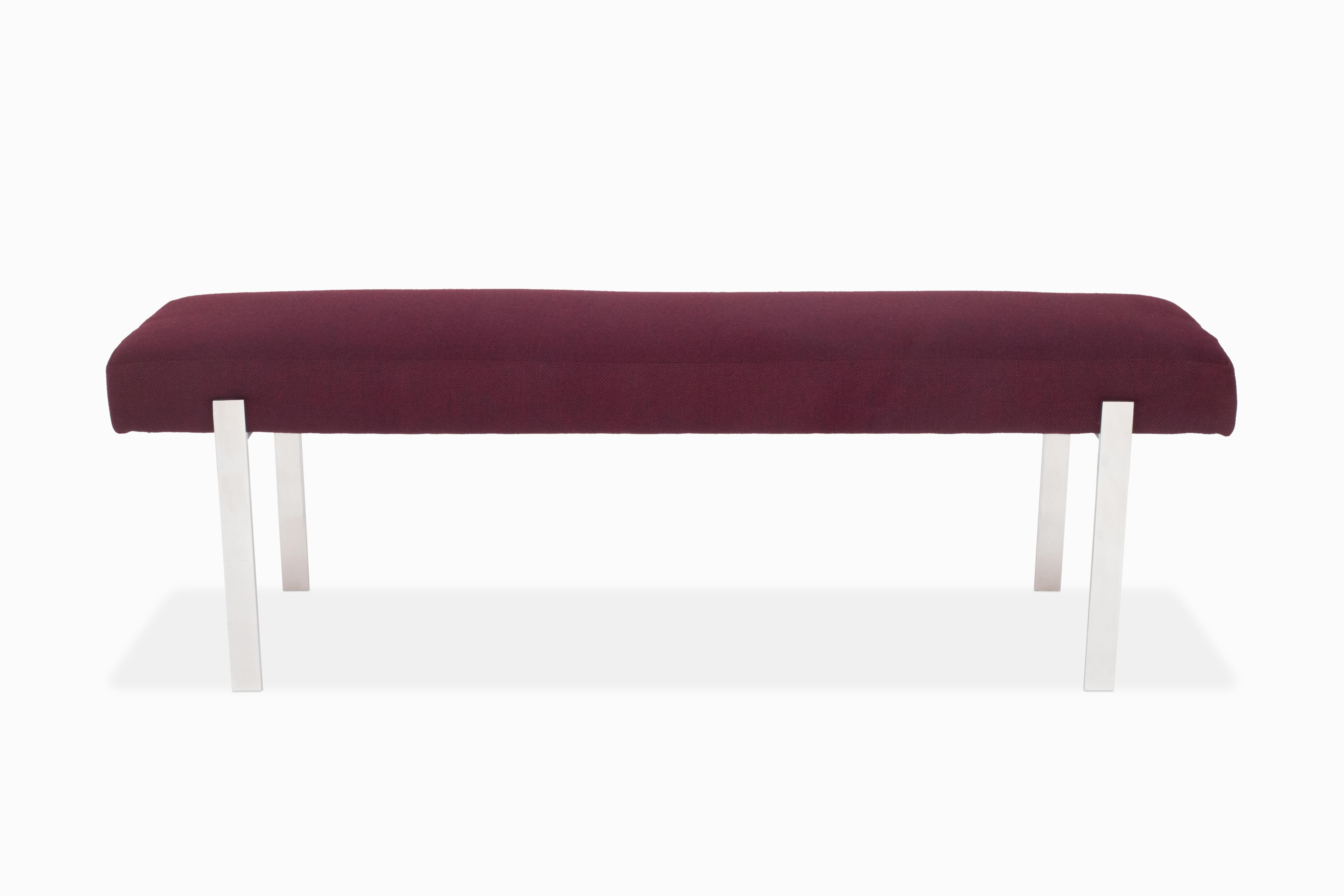 Here is a simple yet stunning bench by Pace Collection. It features a chromed flat-bar steel frame and is clad in all new 