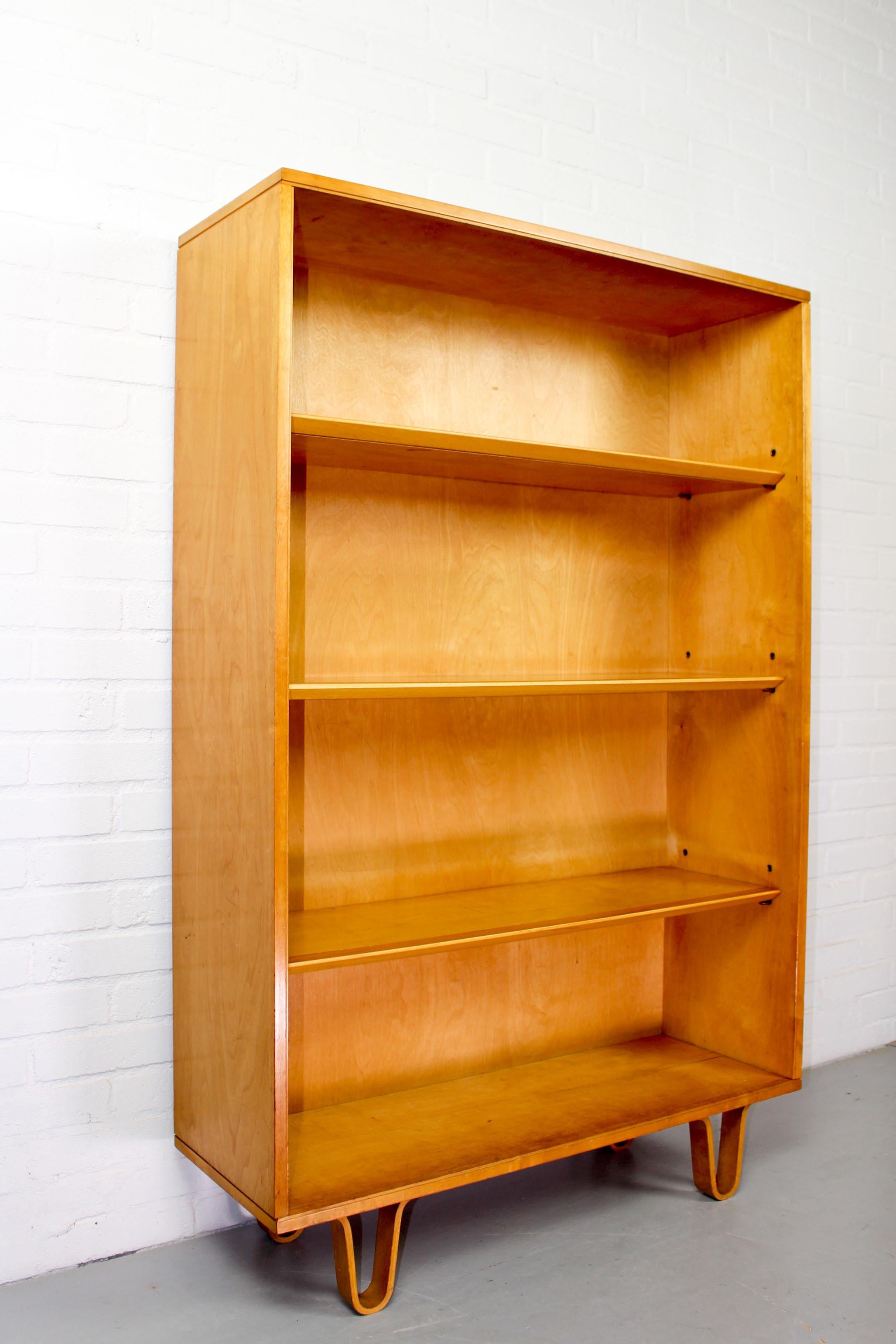 Birch series bookcase by Cees Braakman for Pastoe. The Birch series are famous for their bended legs. A design from the 1950s and very collectible these days. This bookcase is in a good condition with some usermarks from age and use. It is marked by