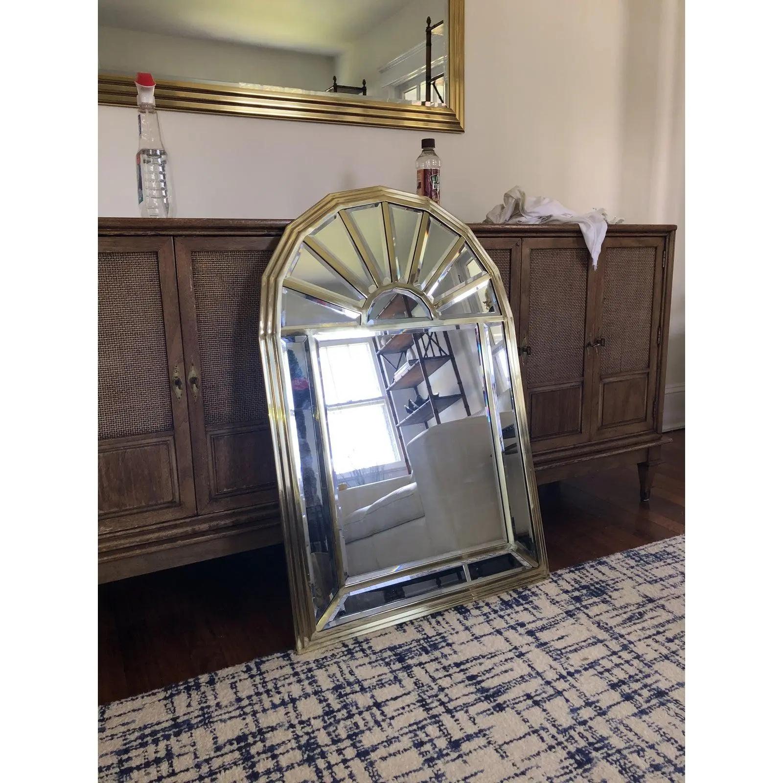 Wonderful Brass Arc form mirror with beveled mirror panels. Nice wide banding throughout. Stepped edging for that something special. Awesome light catching and reflective rays. Felt lines backing. In the manner of Mastercraft and Crespi. Beautiful!.