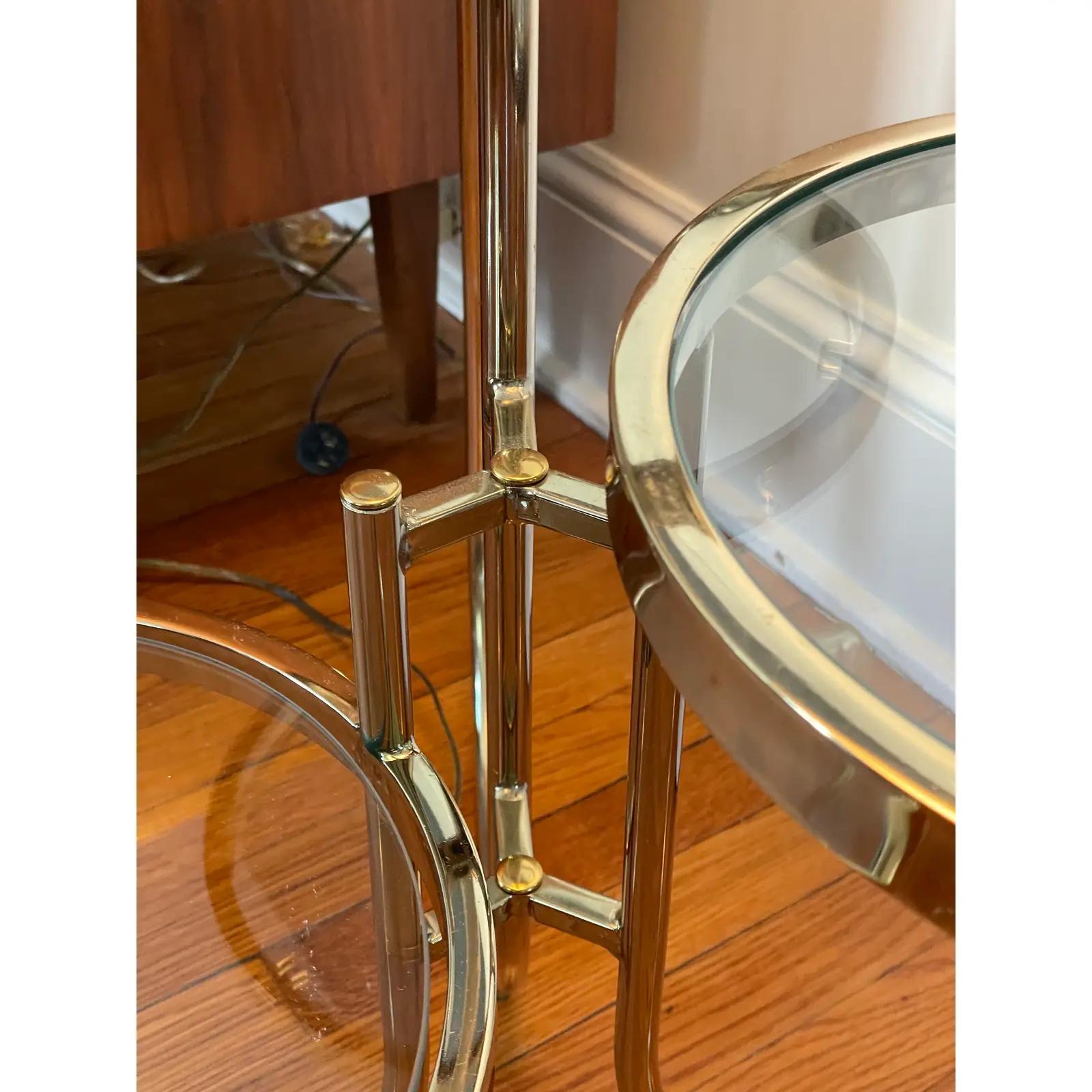 Unique mid century modern polished brass floor lamp with three round built in tables or stands. Great design and quality. 3 round glass tables.
Curbside to NYC/Philly $350