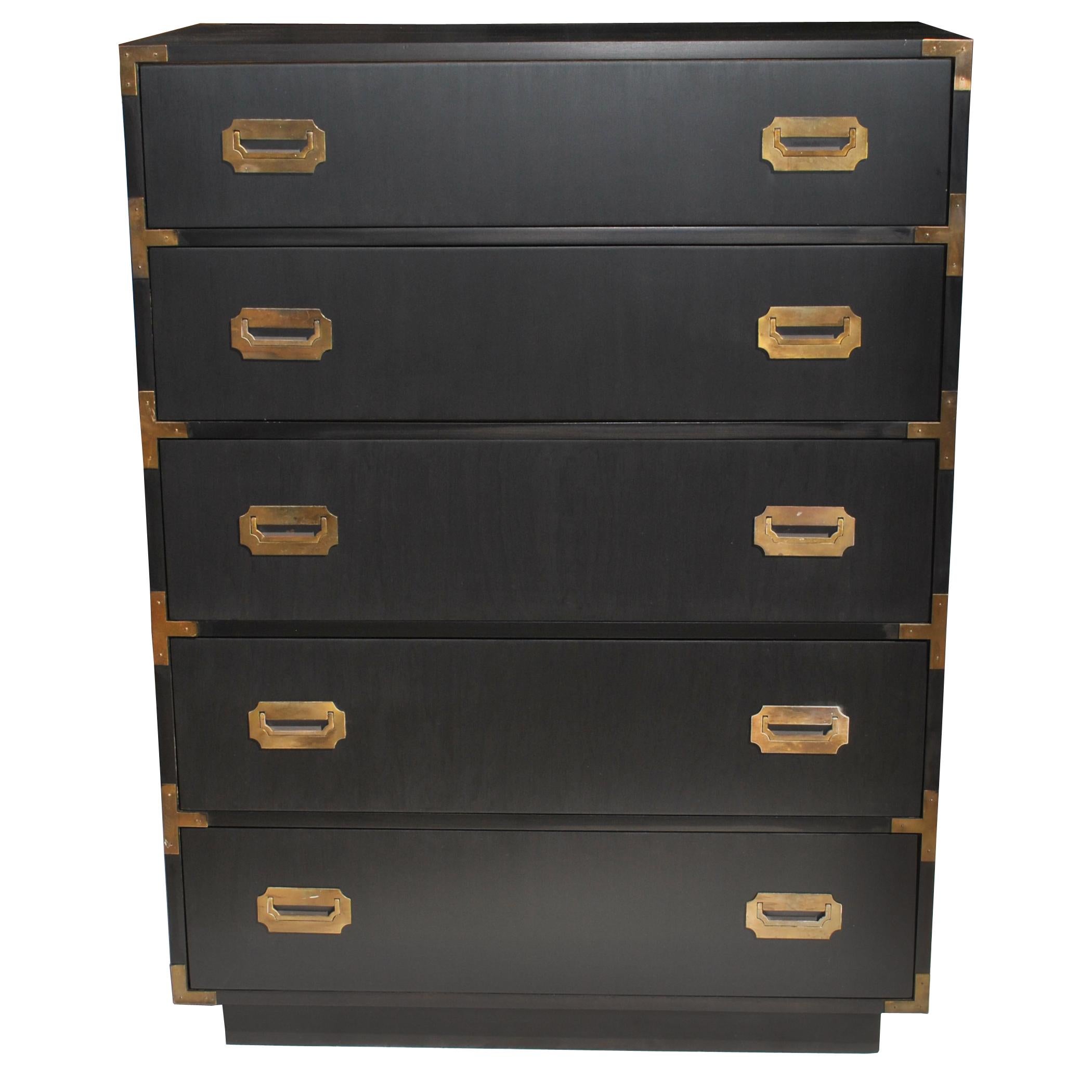 Vintage midcentury Campaign style dresser by Dixie 

Campaign style with brass pulls and accents in an ebonized finish. 
Stamped with Manufacturer.

 